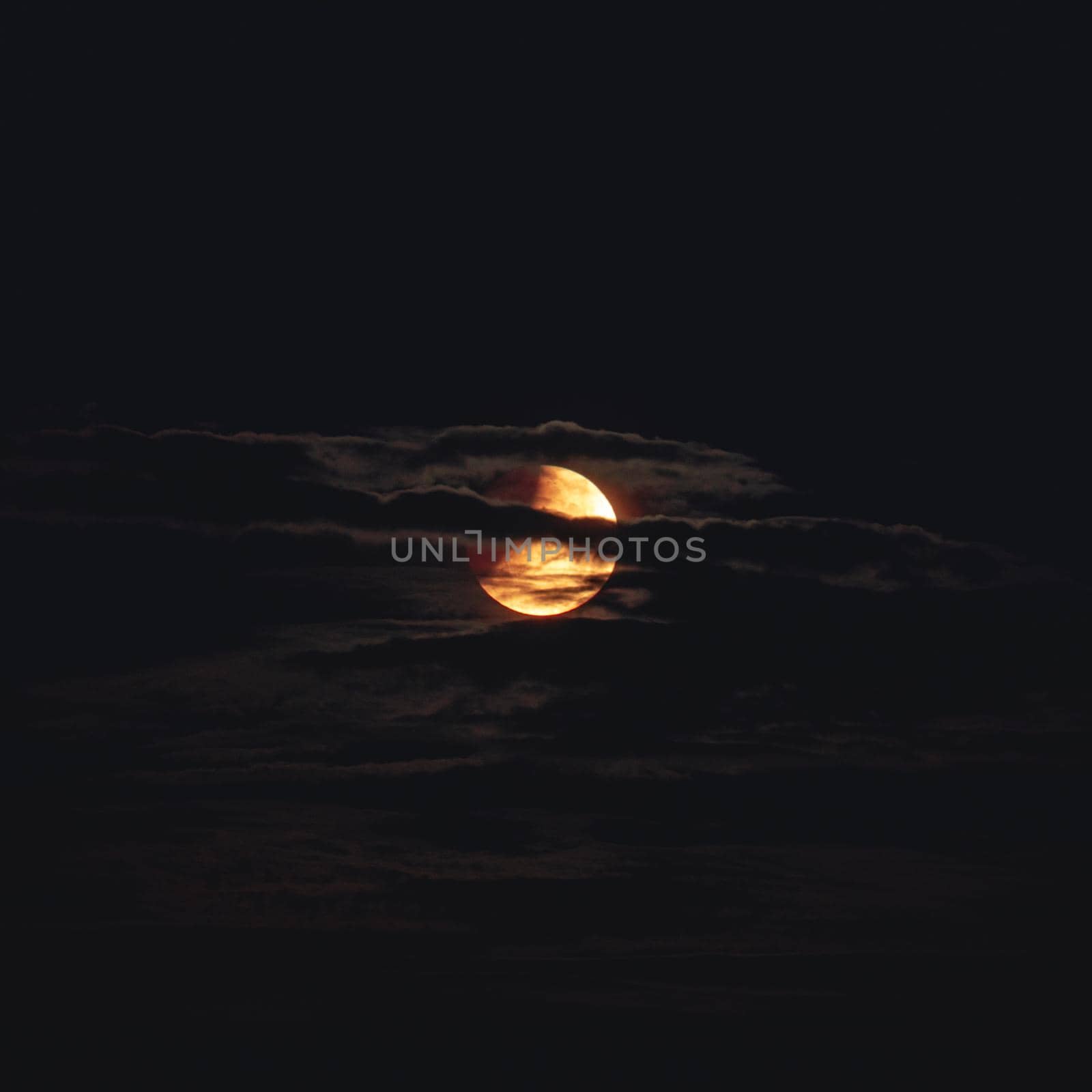 Full moon with clouds, in The Netherlands