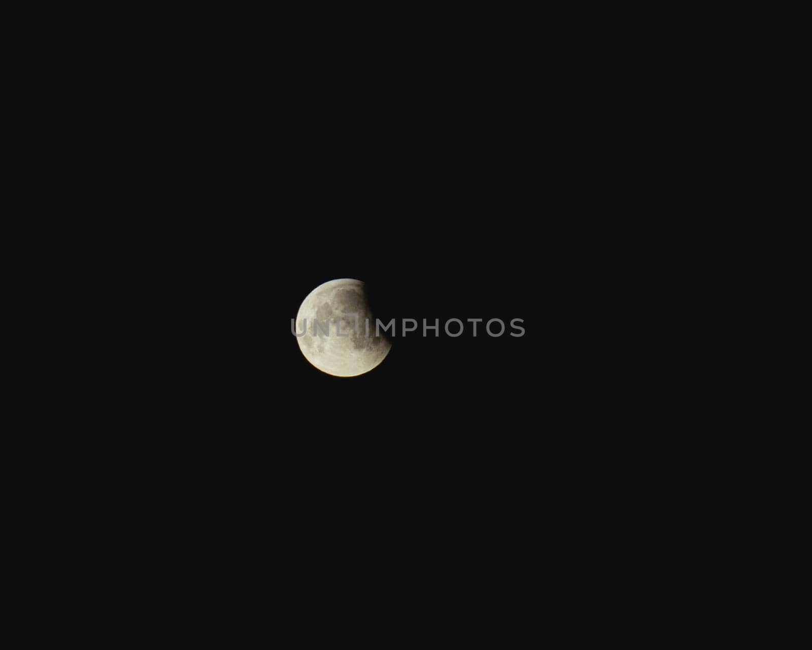 Full moon with clouds, in The Netherlands.