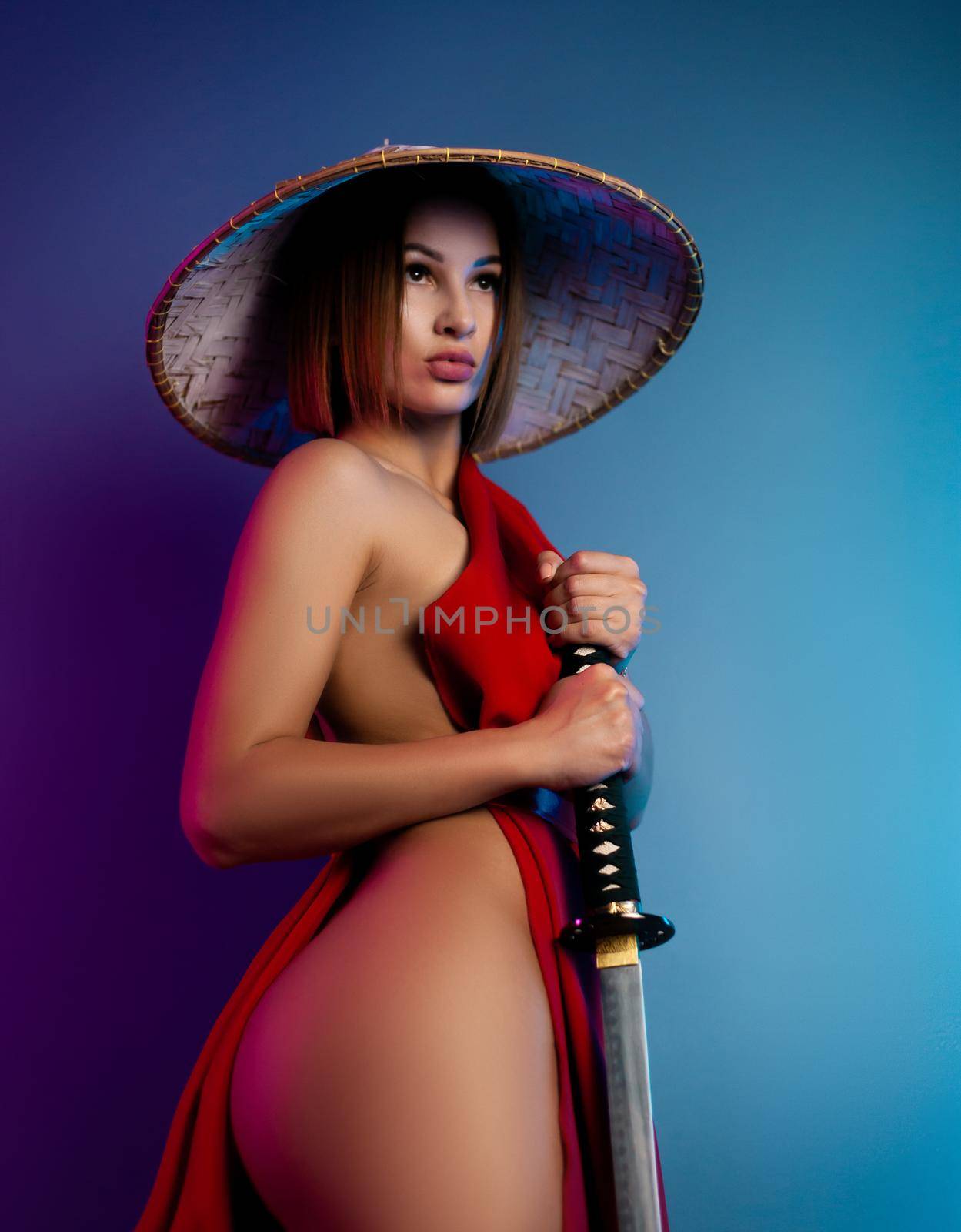 sexy woman in a red cape and an Asian hat with a katana in her hand image of a samurai in neon color by Rotozey