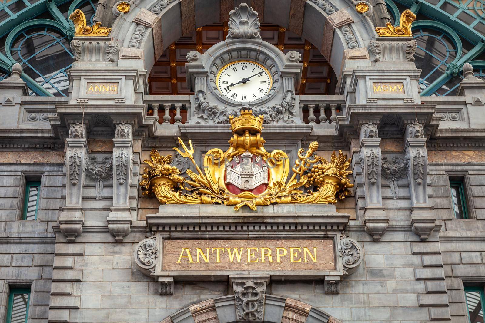 Ornate Antwerp Central Train Station indoors with clock, Belgium