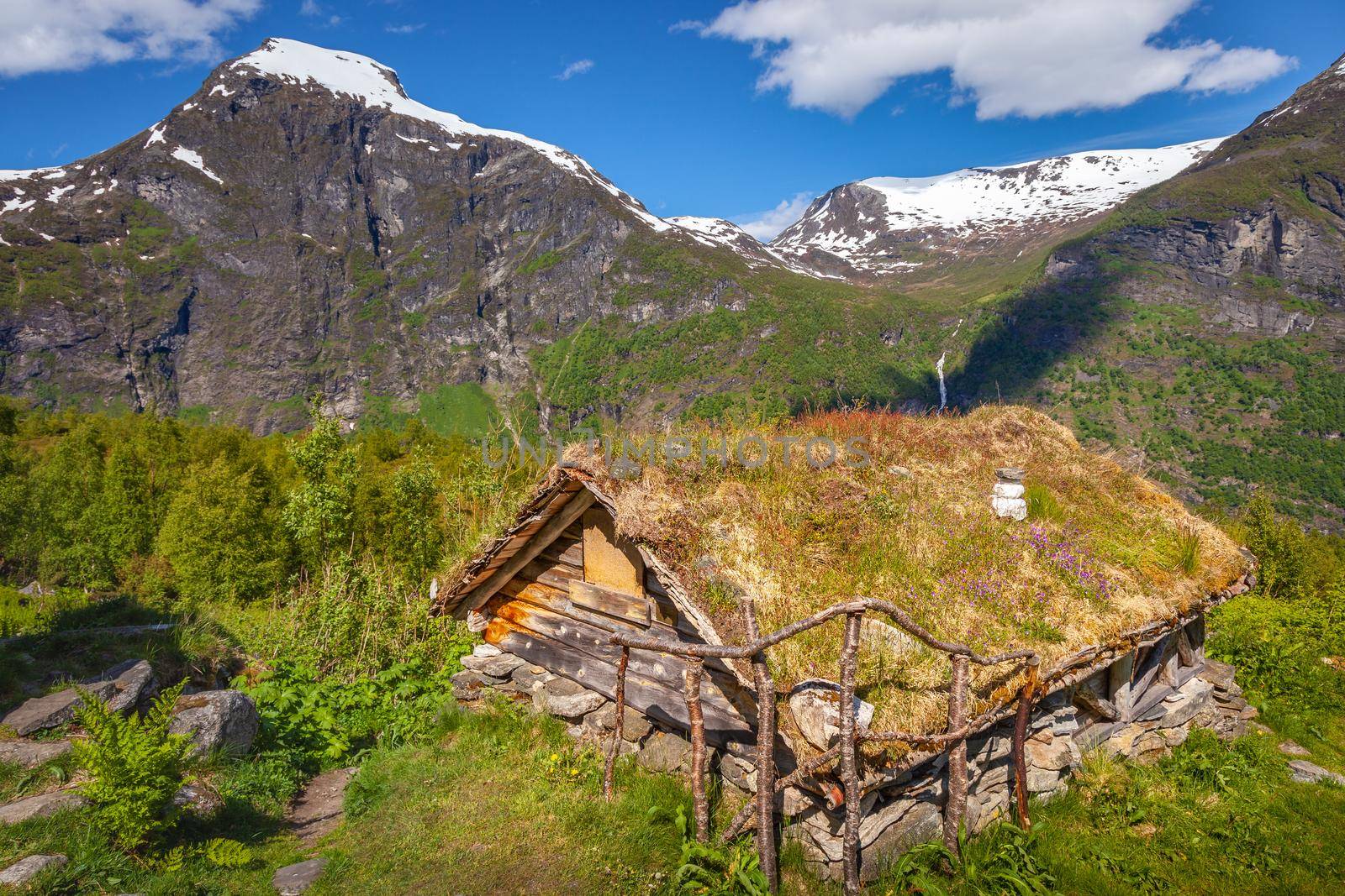 Geiranger typical rustic barn in More og Romsdal at dramatic sky, Norway, Northern Europe