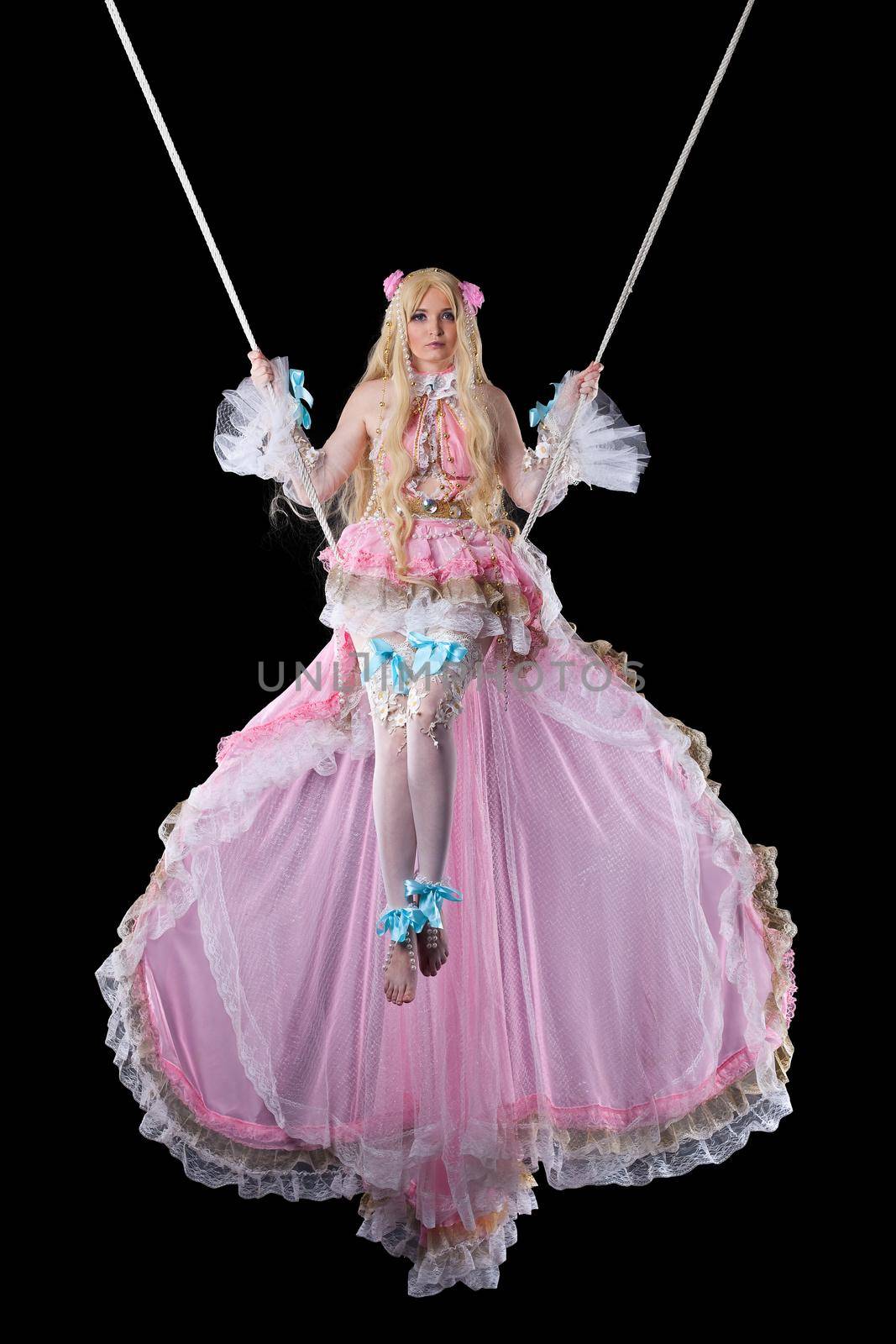 Pretty girl in fary-tale doll costume fly by rivertime