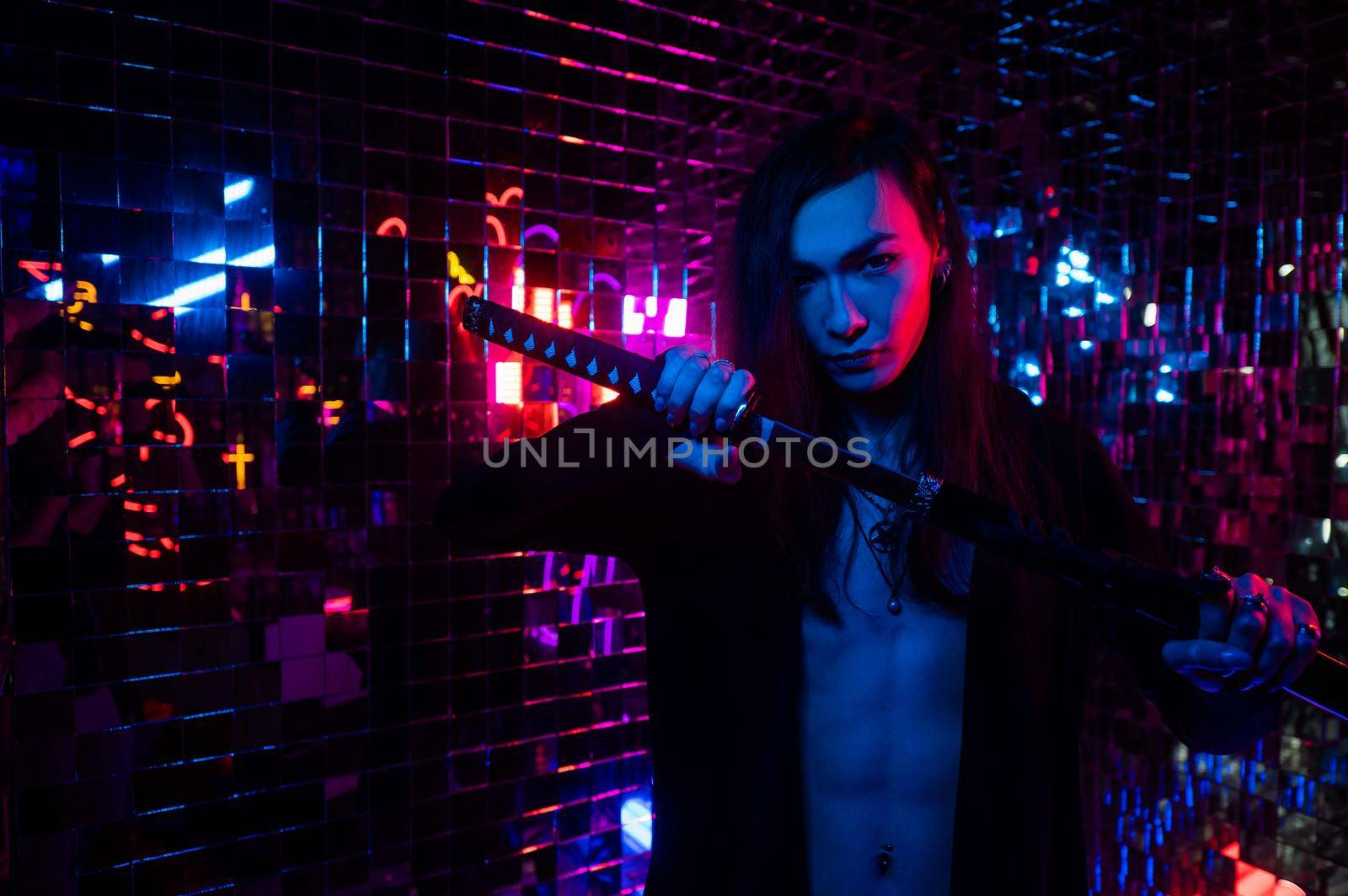 Male transgender neon light studio. Asian with samurai sword