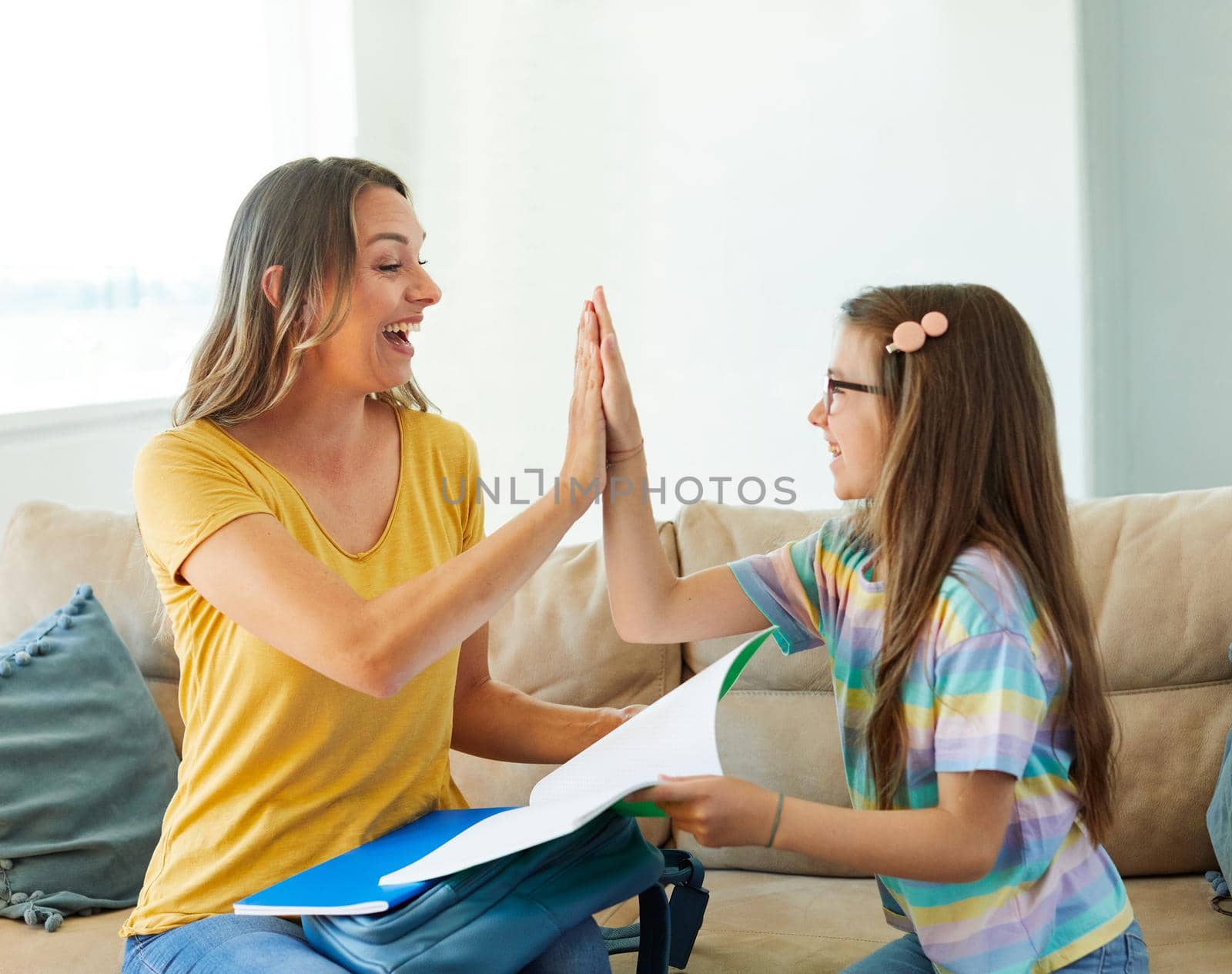 child mother family education school girl home daughter backpack help parent getting ready elementary teen morning hug love helping together high five by Picsfive