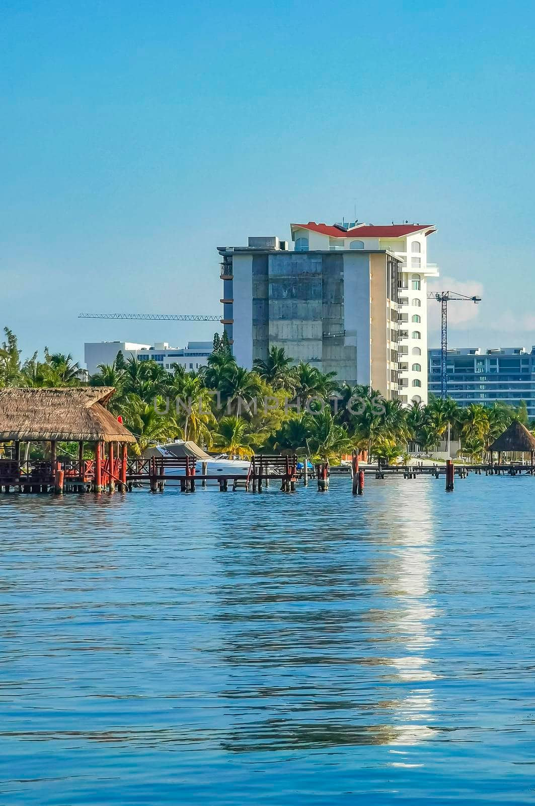 Beautiful Playa Azul beach and seascape panorama with blue turquoise water hotels resorts and palm trees in Cancun Quintana Roo Mexico.