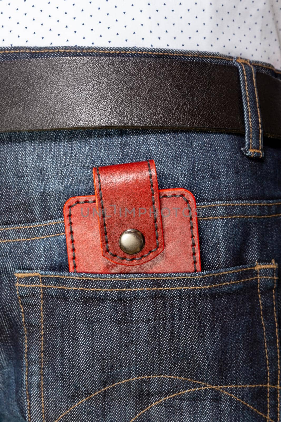 Luxury craft business card holder case made of leather. Red Leather box for cards in the back pocket of jeans.
