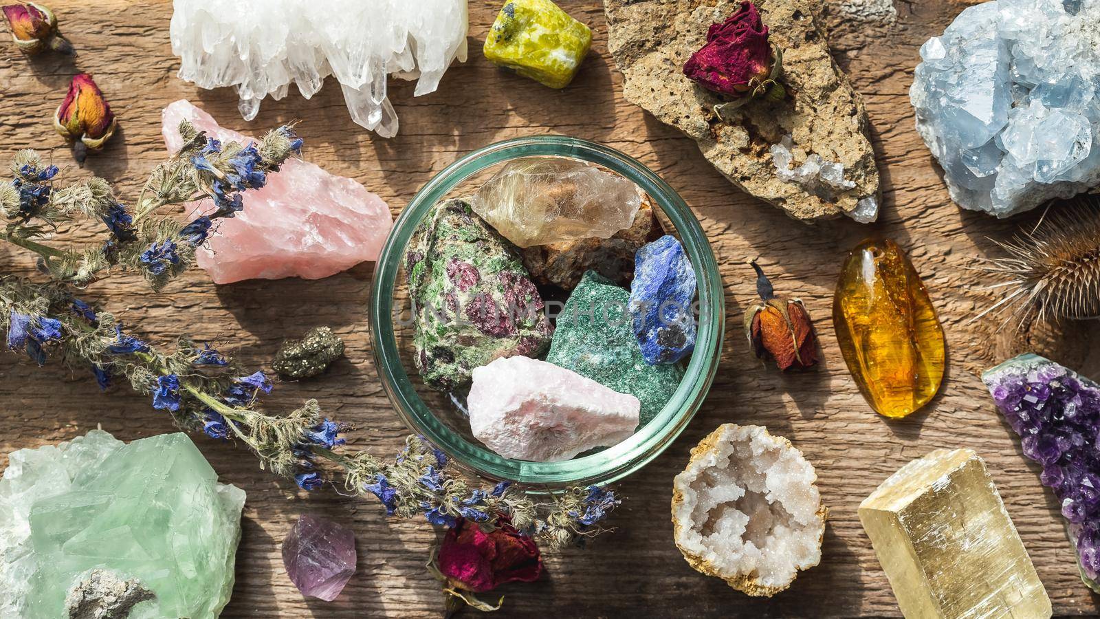 Colorful healing crystals and minerals set up by Syvanych