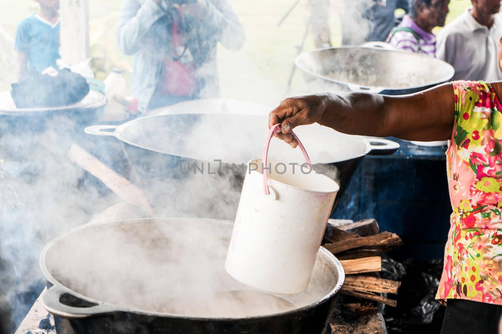 Distributing beef soup known as Luk Luk, a typical dish of the indigenous communities of the Caribbean Coast of Nicaragua and Central America