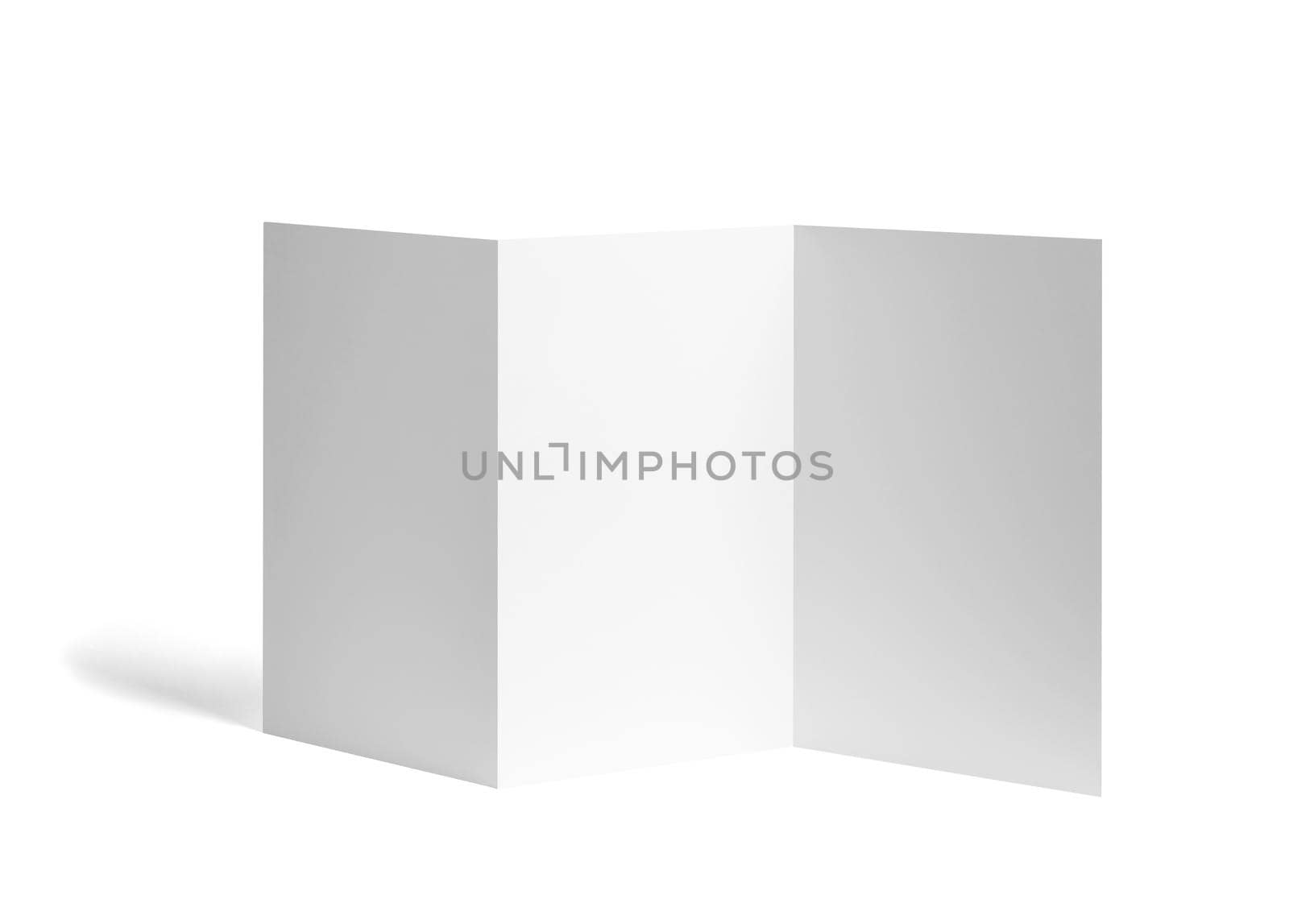 close up of a blank folded leaflet white paper on white background