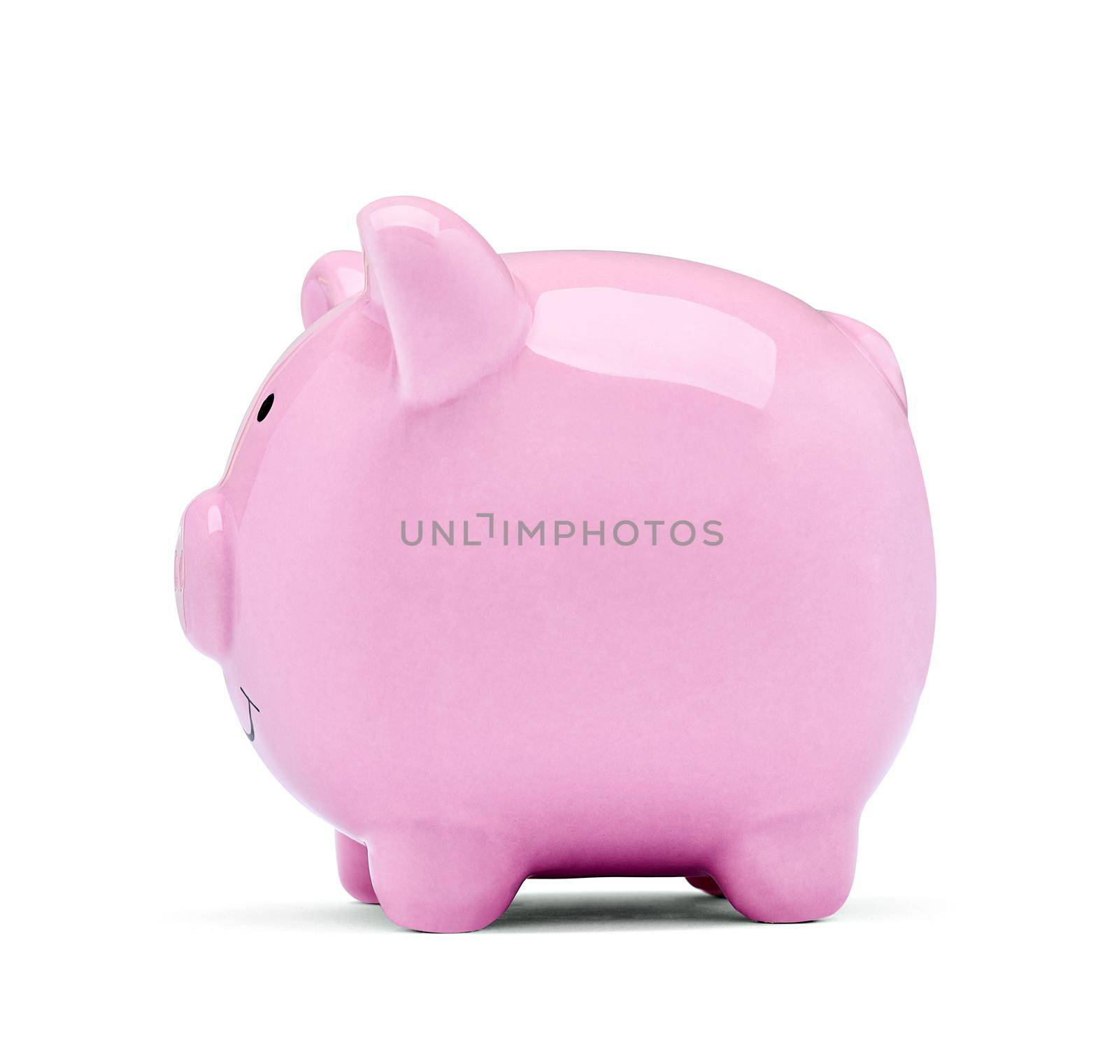 Close up of a pink piggy bank on white background