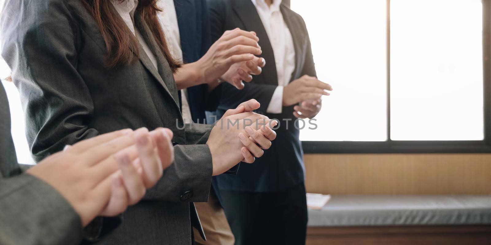 Business people clapping their hands, congratulation and appreciation concepts by wichayada