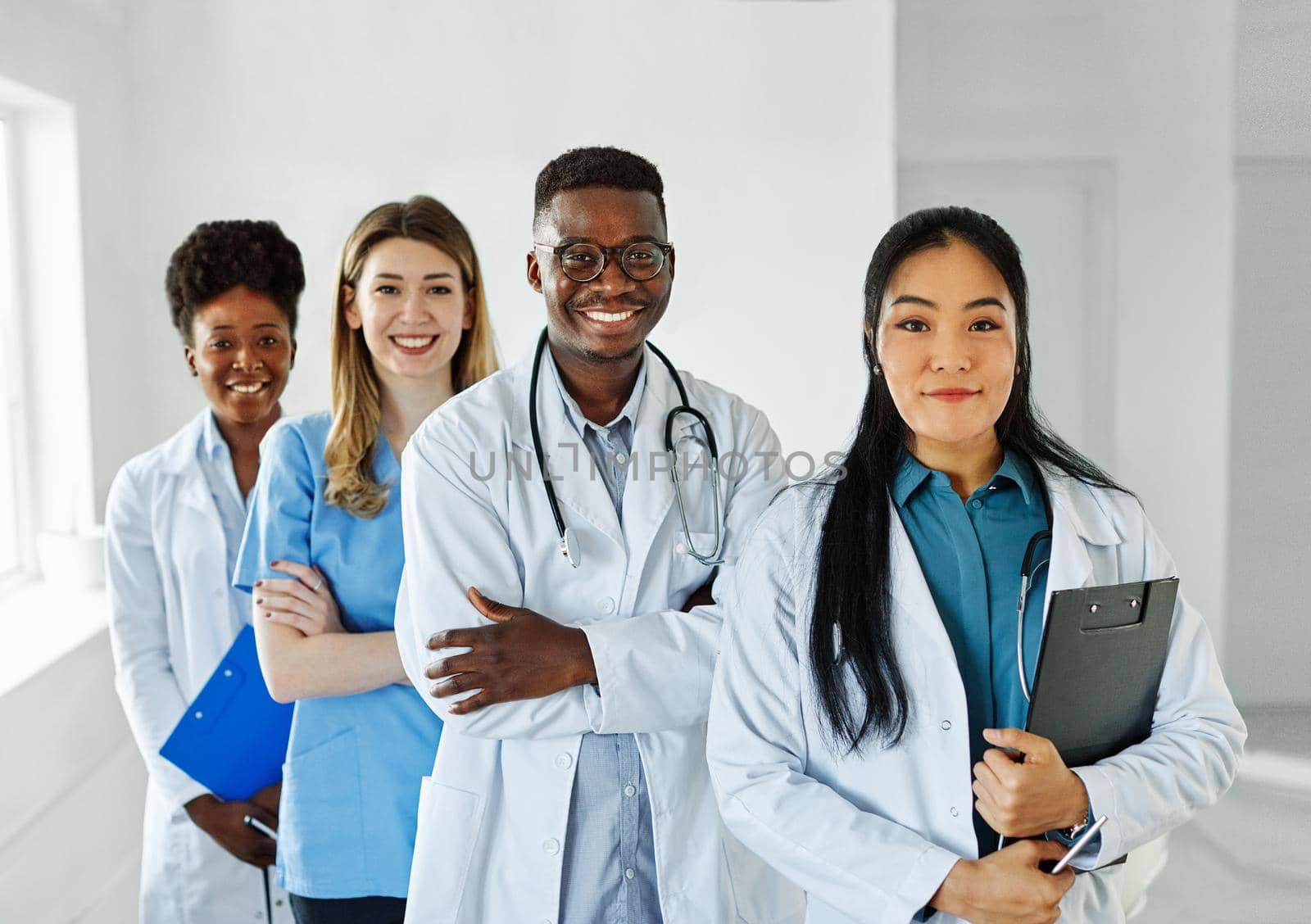 Portrait of a group of happy doctors and nurses of diversity race in hospital