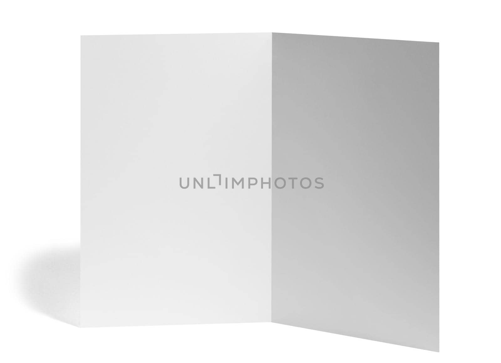 close up of a blank folded leaflet white paper on white background