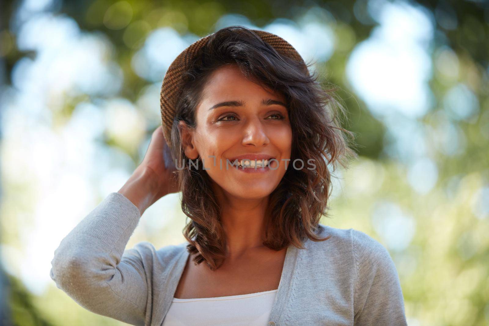 The outdoors are my favorite. Portrait of a beautiful young woman spending the day outdoors on a sunny day