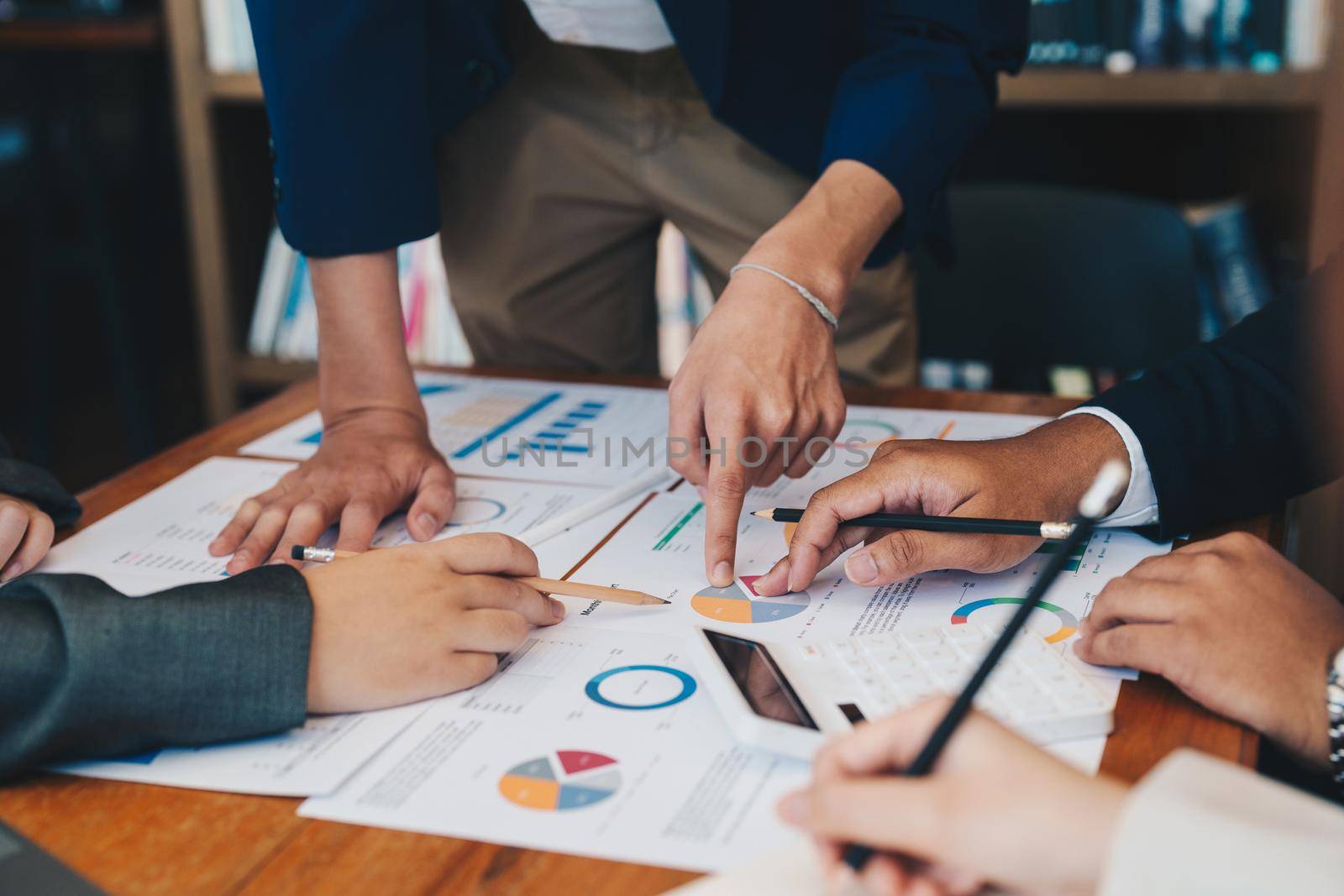 business adviser meeting to analyze and discuss the situation on the financial report in the meeting room.Investment Consultant, Financial advisor and accounting concept.