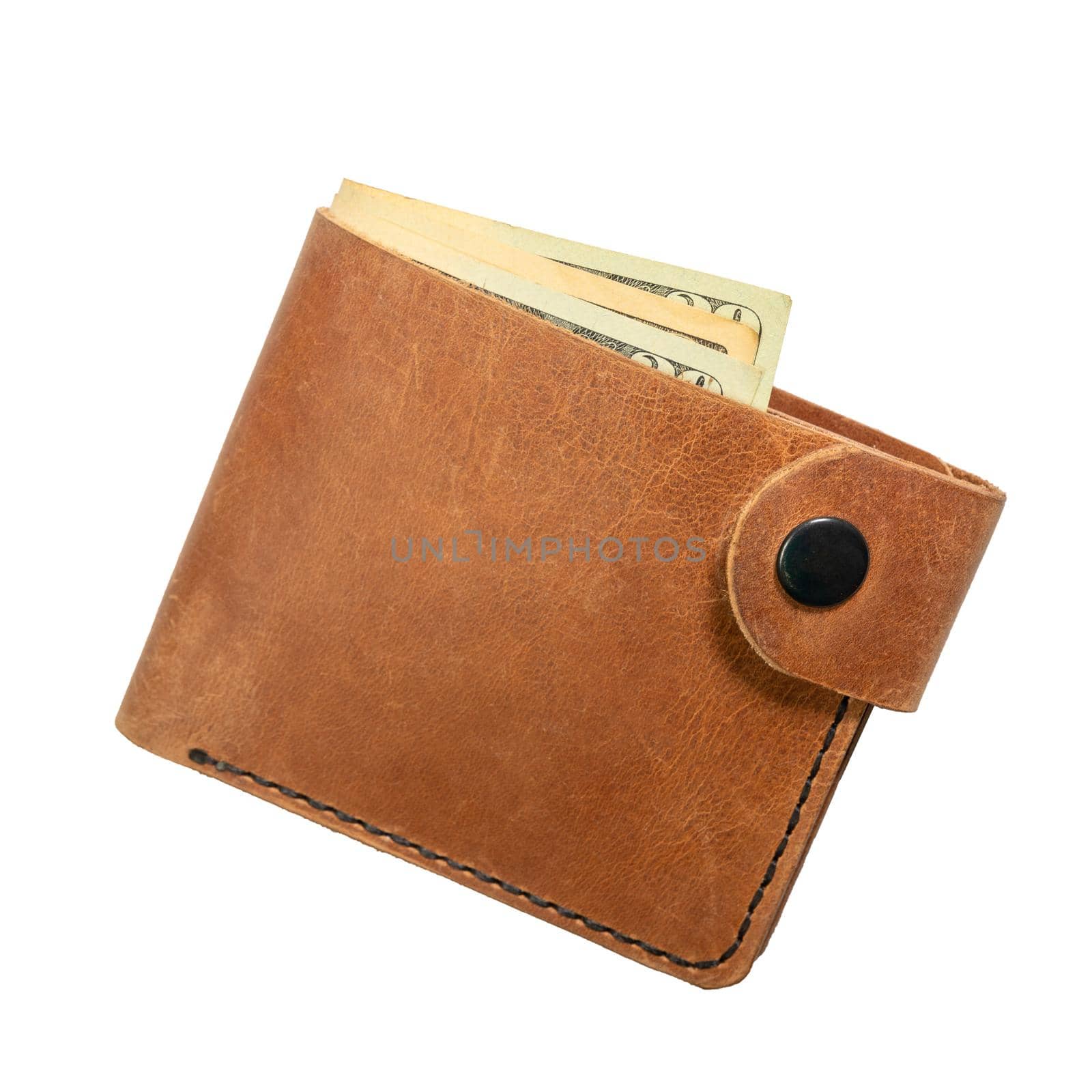 Open brown mens wallet with money and credit cards isolated on a white background close-up