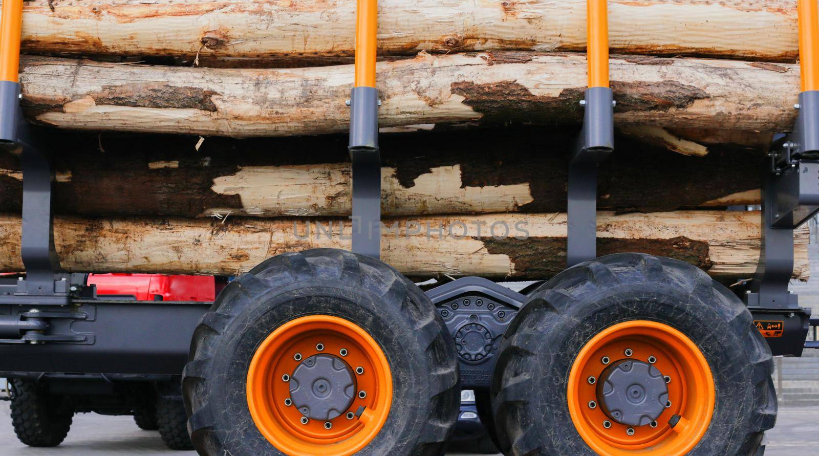 Automobile transportation of lumber. Lumber transportation with a large logging truck.
