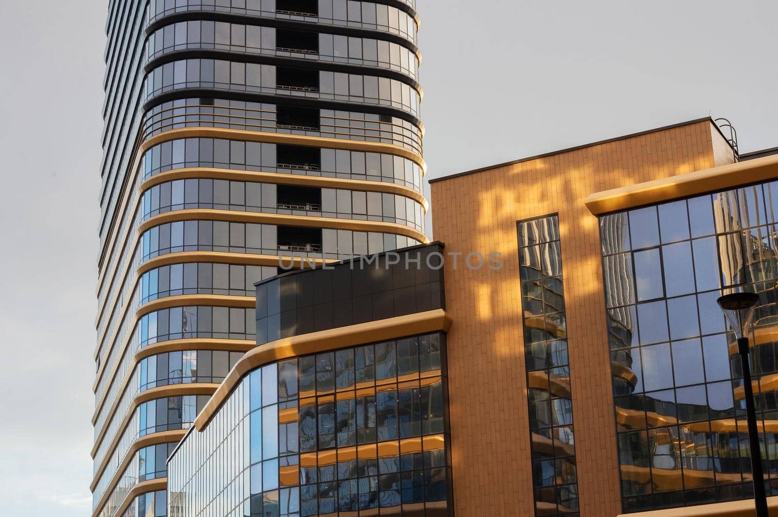 Fragment of skyscrapers with large glass windows. by gelog67