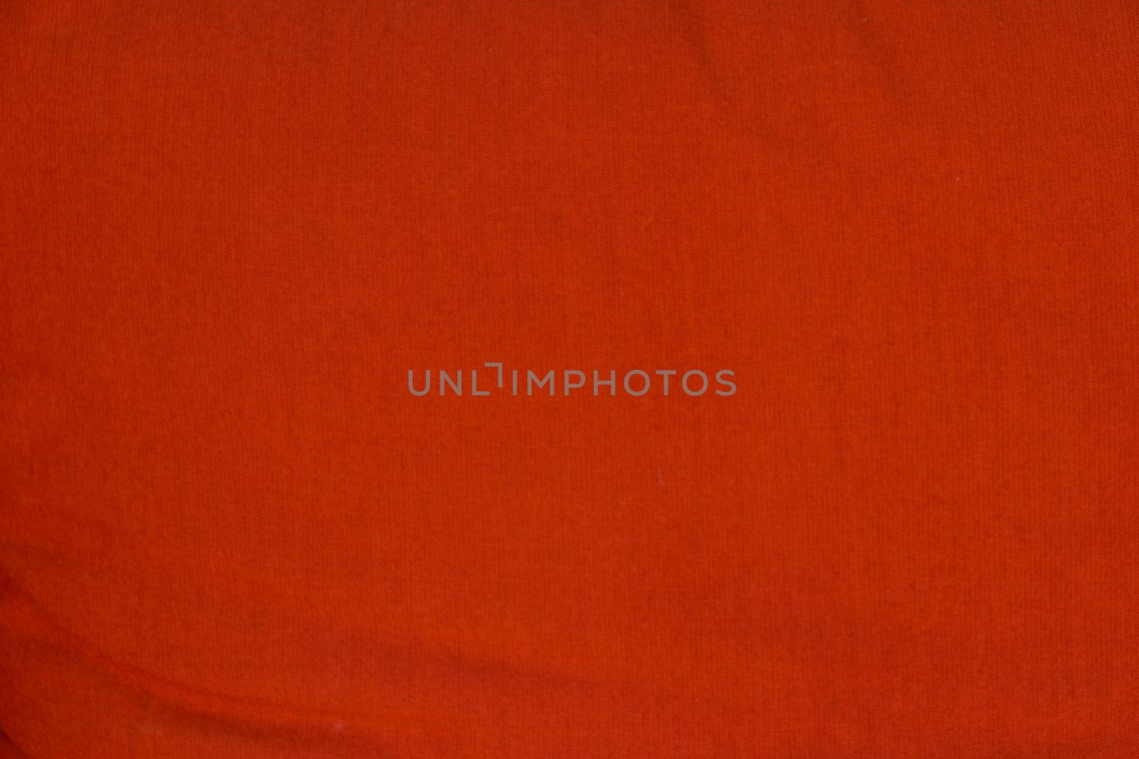 Red wrinkled fabric texture for background