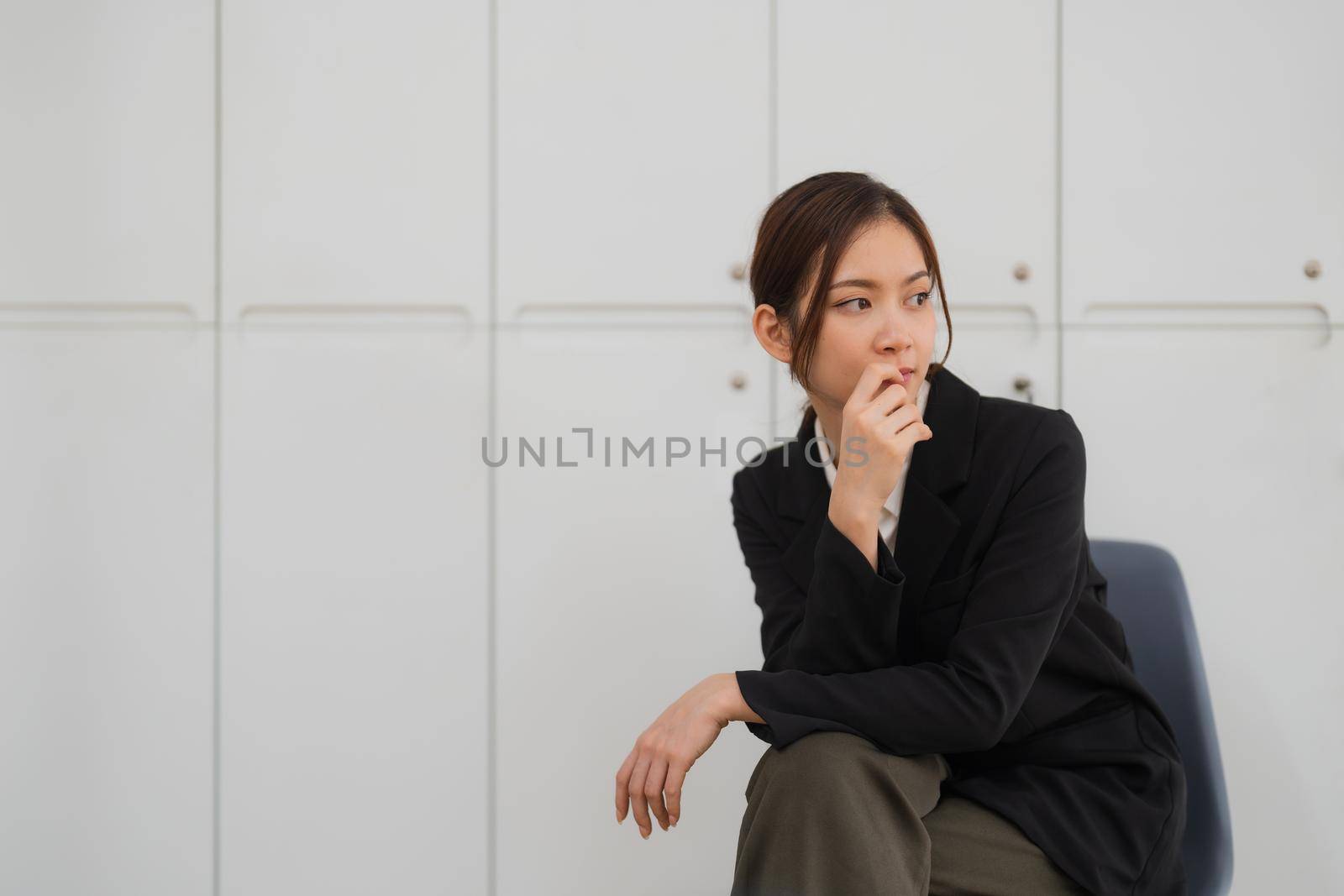 Portrait of smiling confident aisan female in office