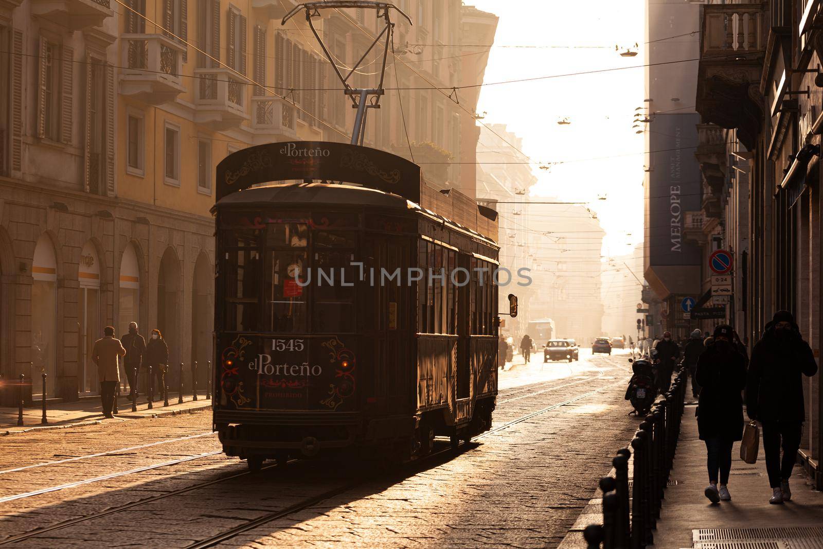 Old vintage tram on the street of Milan, Italy by bepsimage