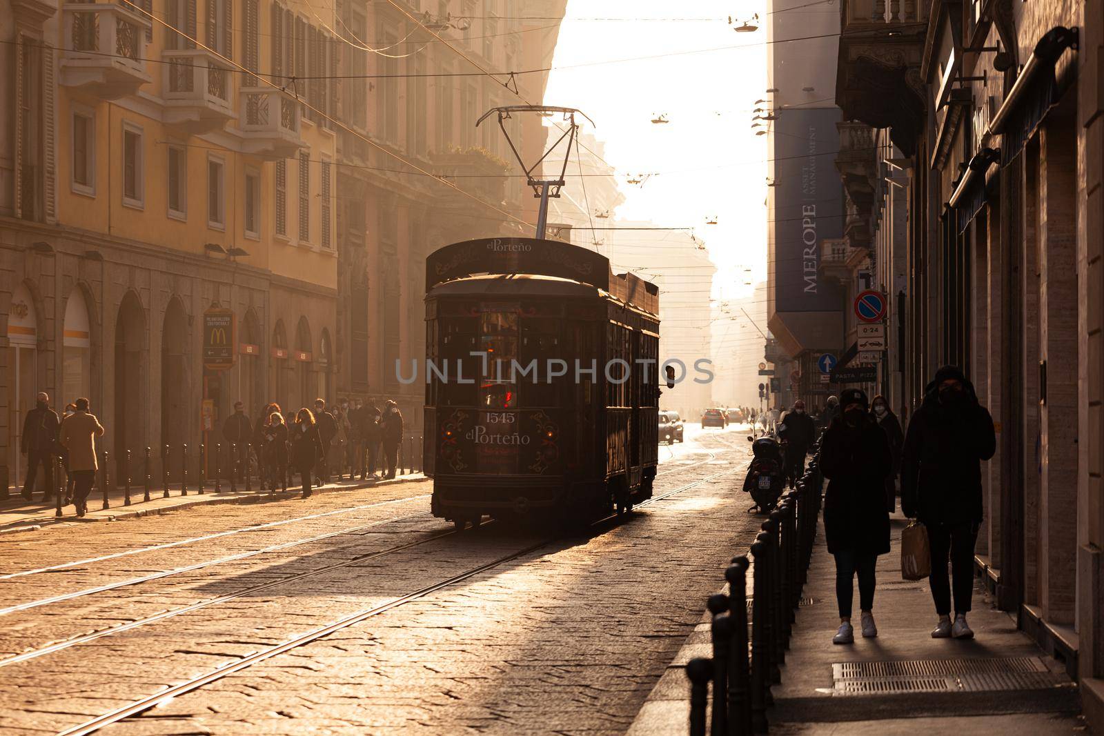 Old vintage tram on the street of Milan, Italy by bepsimage