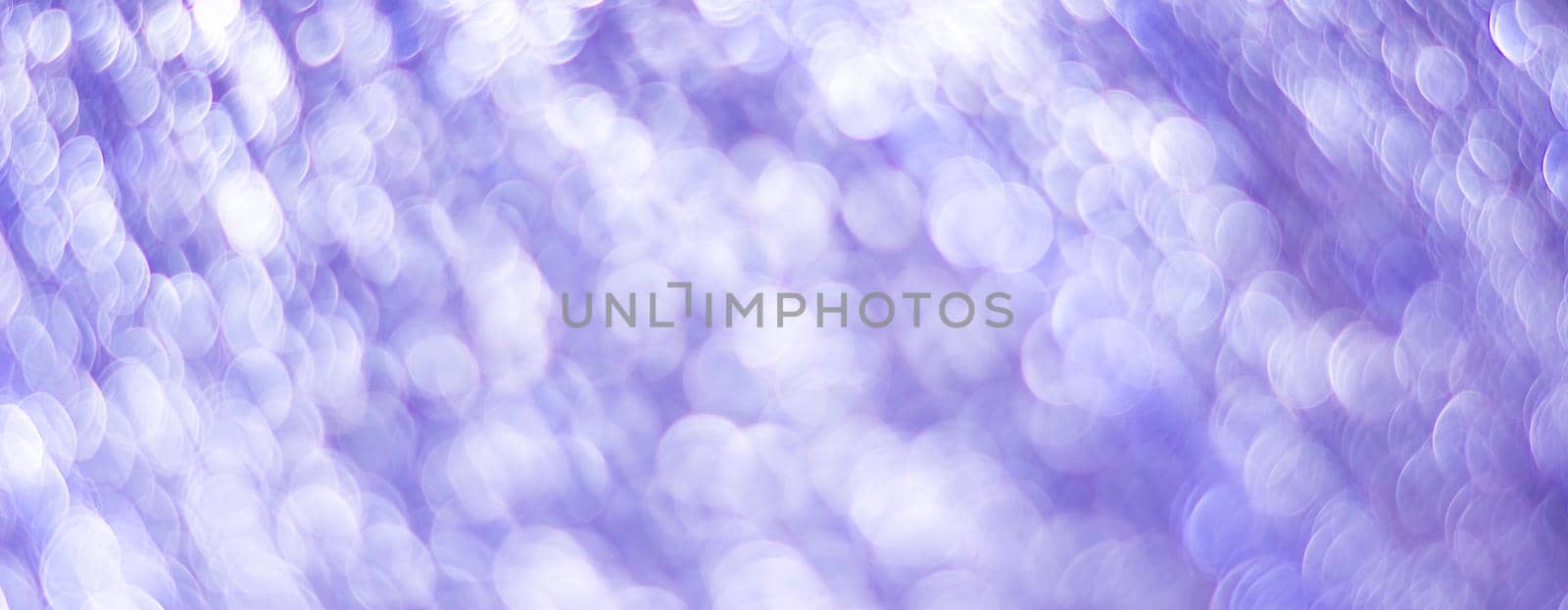 Purple abstract background with bokeh defocused lights