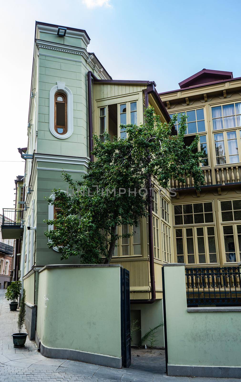 Traditional inner yard with carving wooden baclonies in Kala area in Tbilisi, capital city of Georgia