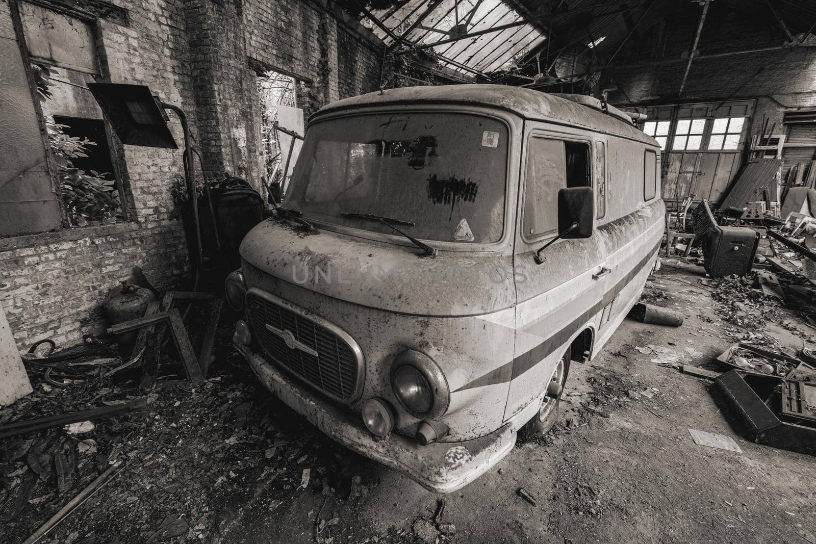 Urbex, abandoned old garage with a old car