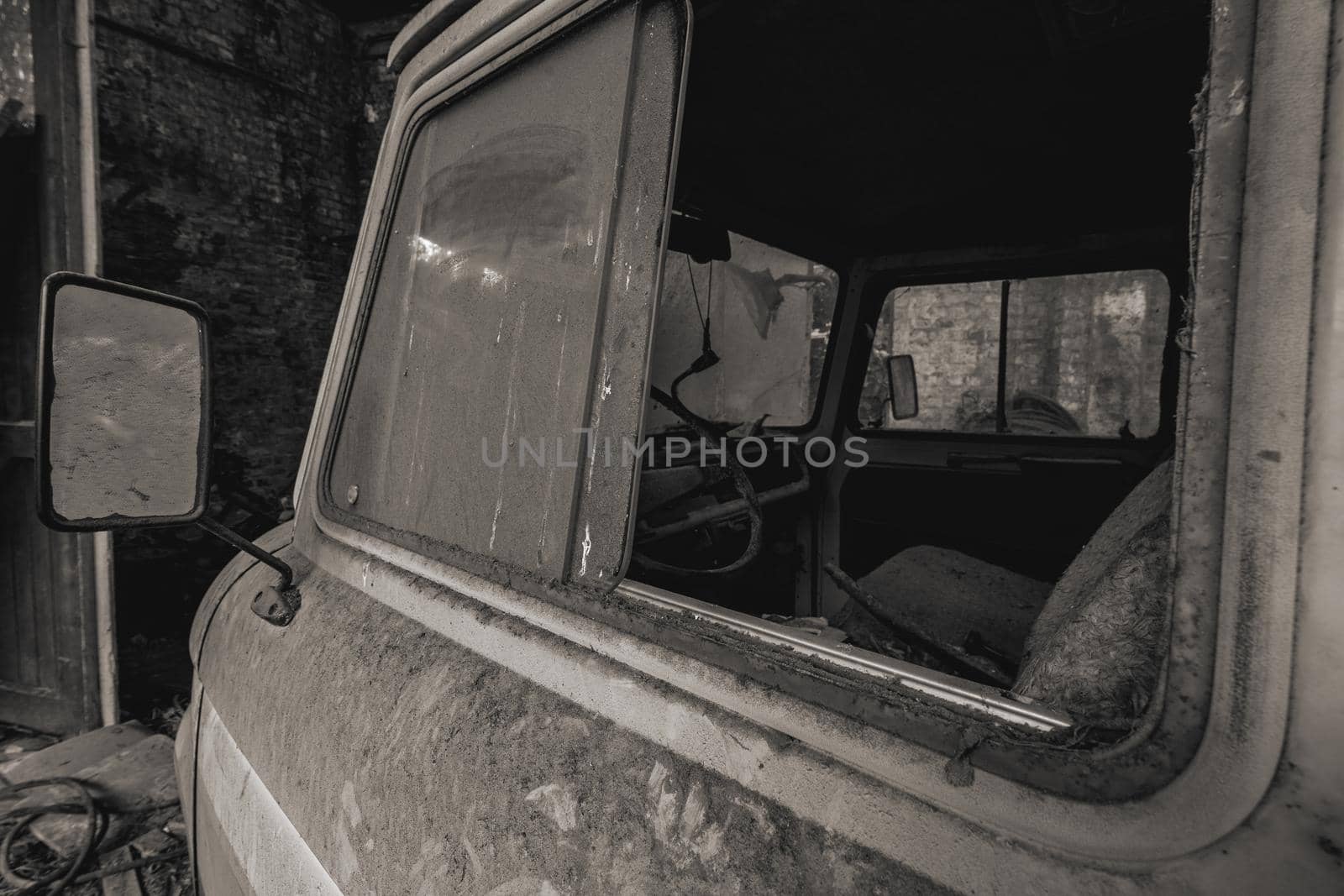 Urbex, abandoned old garage with a old car