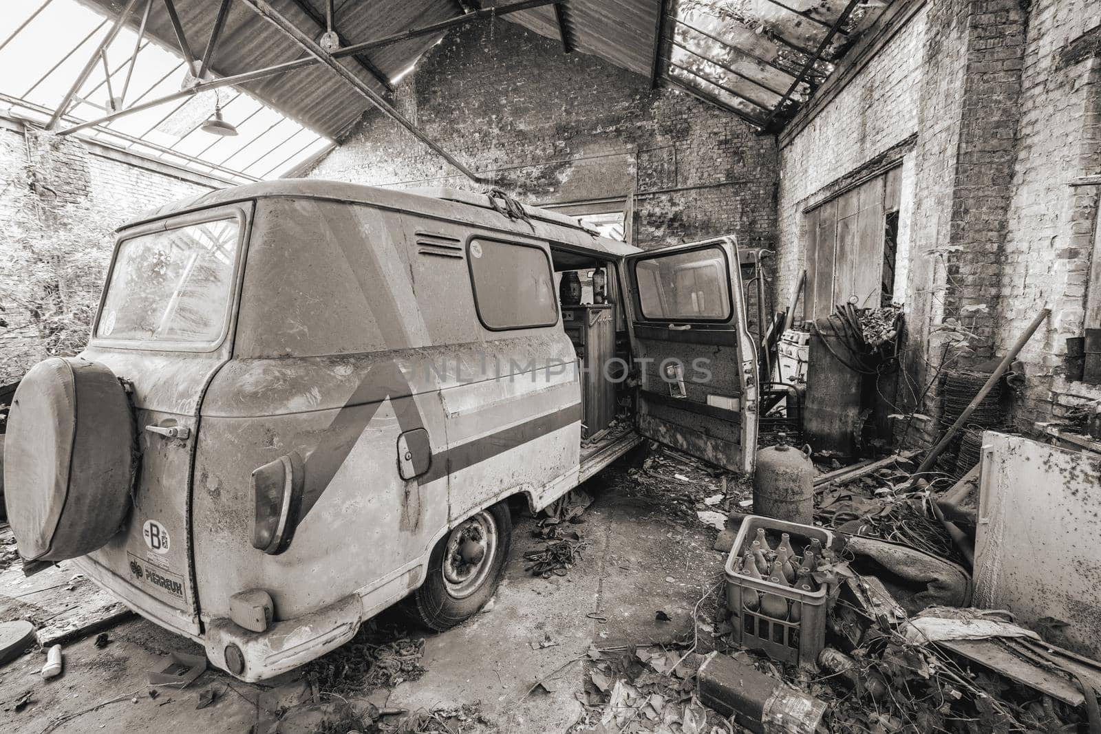 Urbex, abandoned old garage with a old car