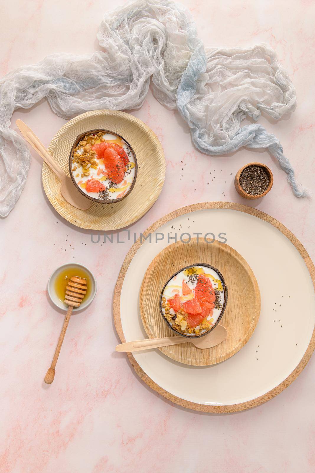 Yogurt with grapefruit, granola, chia and honey by homydesign