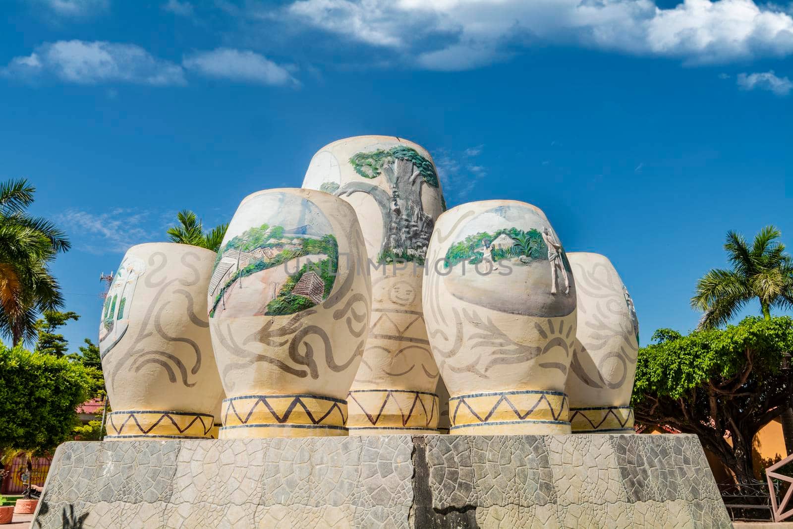 LAS JICARAS fountain in Nagarote park. Las Jicaras cultural fountain in Nagarote, Nicaragua. Cultural gourds in the middle of a fountain on a sunny day by isaiphoto