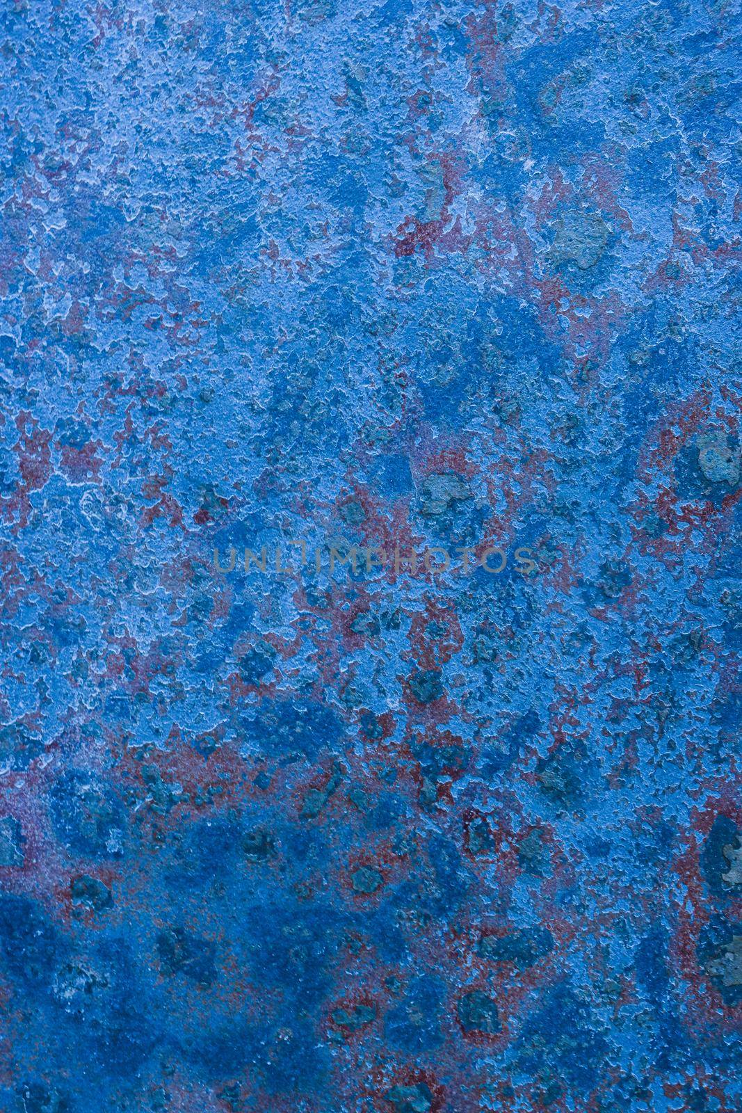 Abstract blue texture of an old wall with paint cracks. blue wall old.