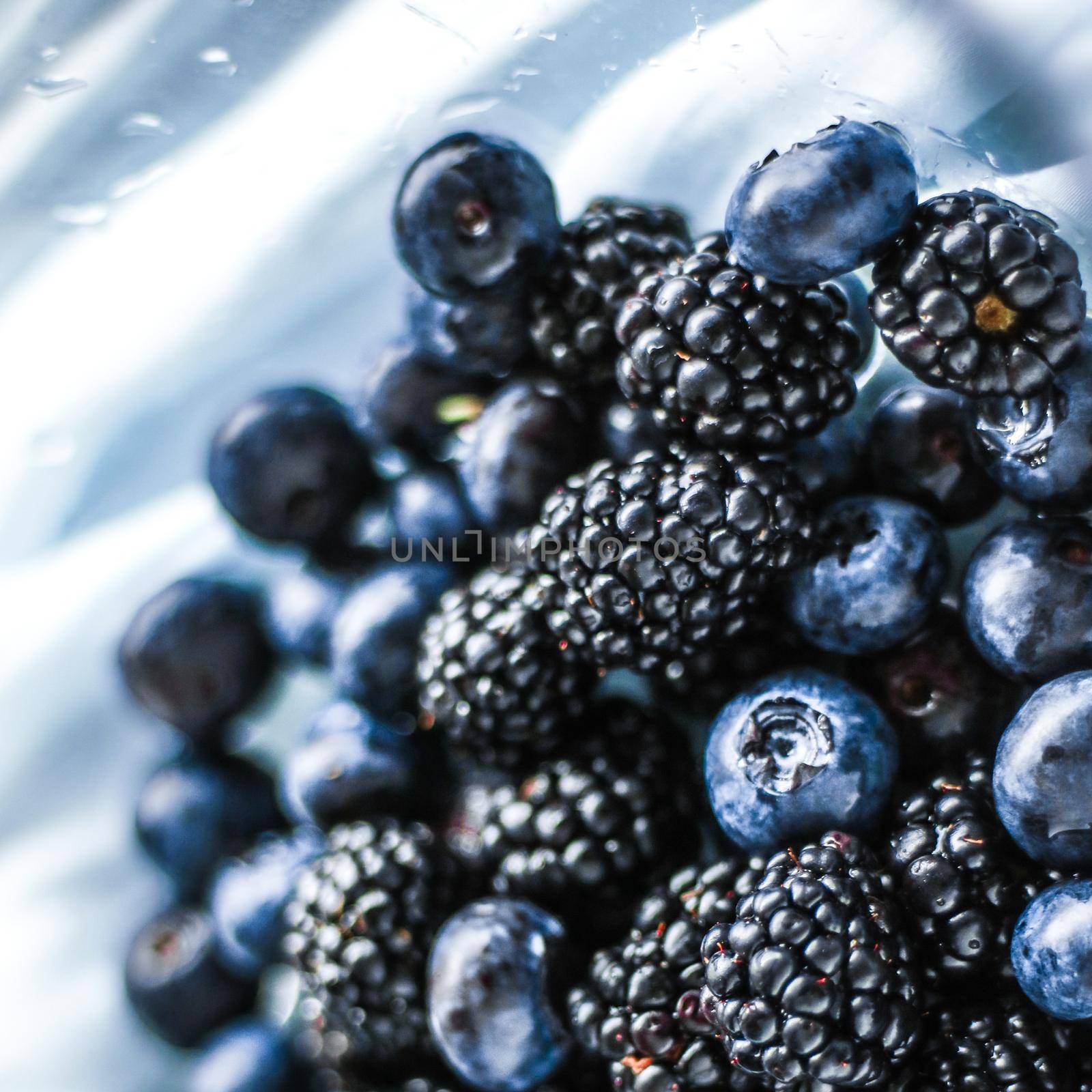 bluberries and blackberries - fresh fruits and healthy eating styled concept by Anneleven