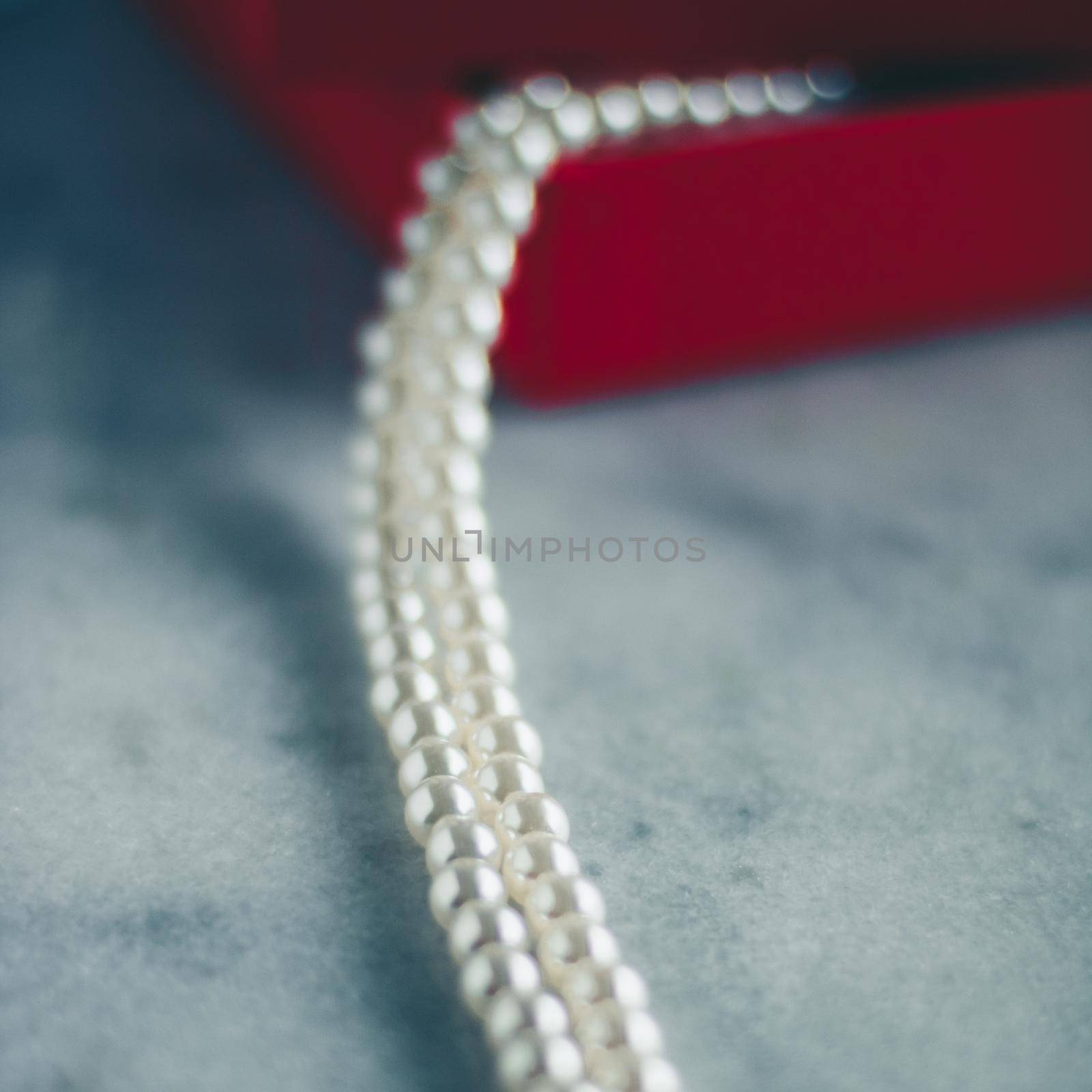 wonderful pearls in a red gift box, luxe present - jewellery and luxury gift for her styled concept