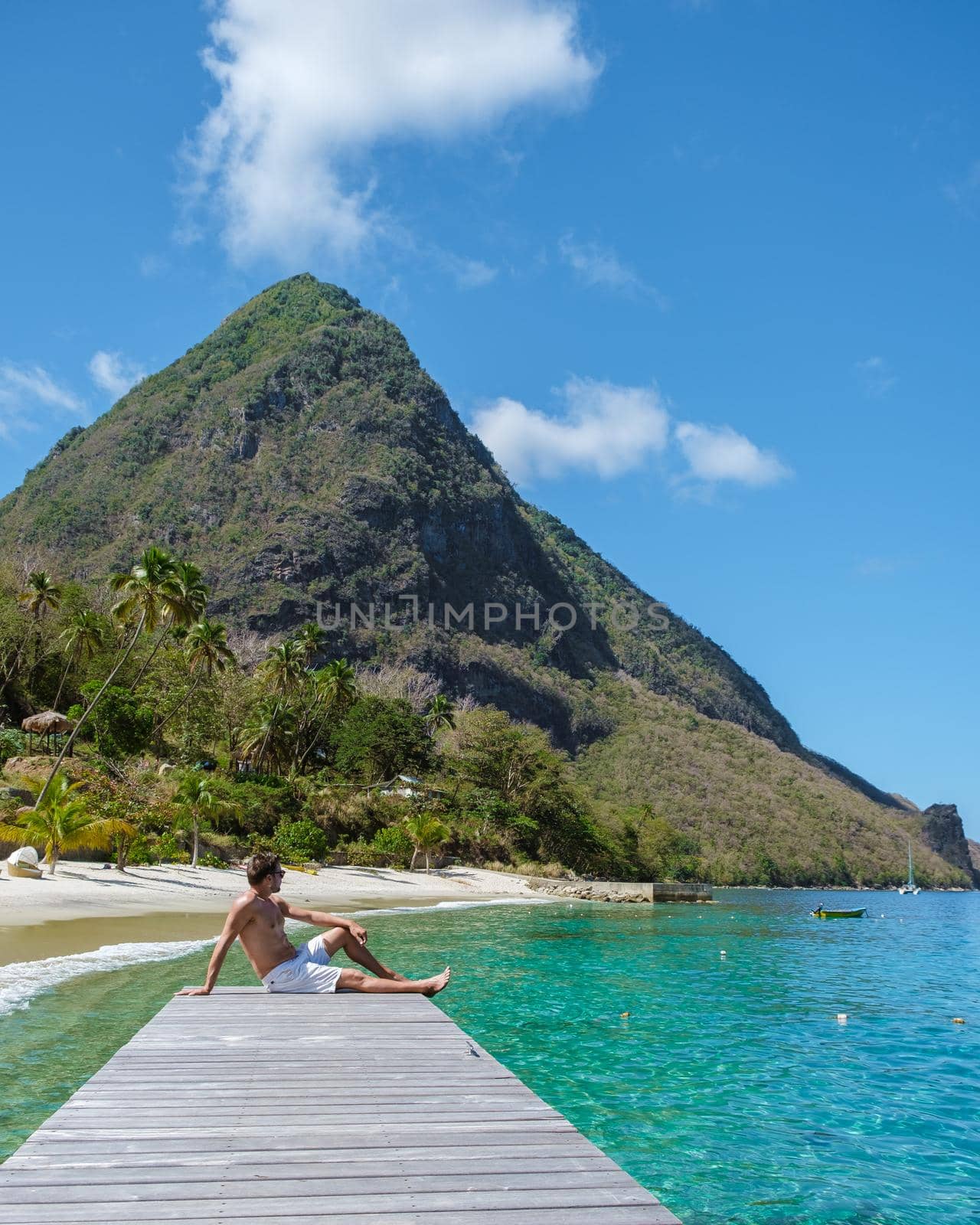 young caucasian men on vacation Saint Lucia, luxury holiday Saint Lucia Caribbean Sugar beach by fokkebok