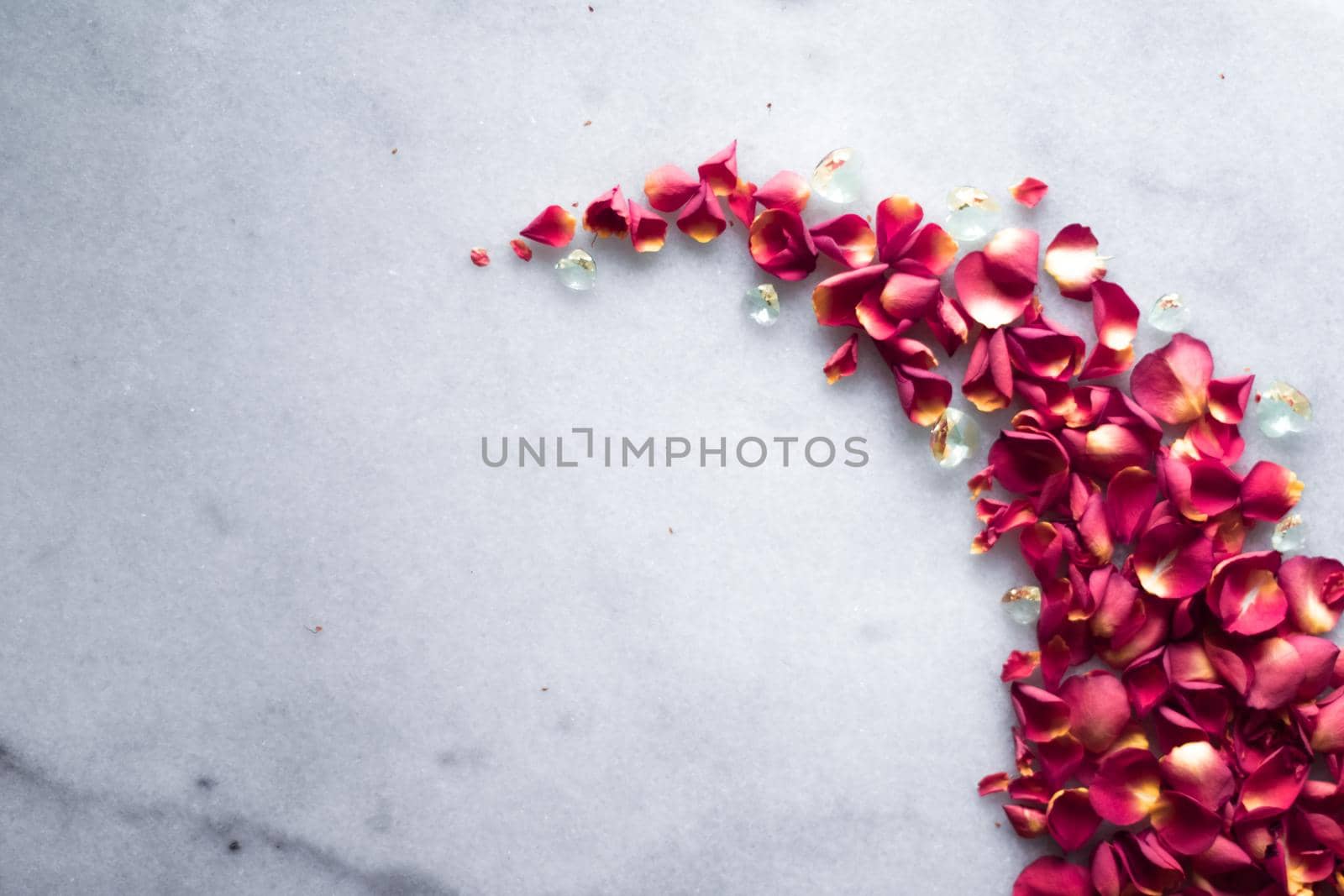 rose petals on marble flatlay - wedding, holiday and floral background styled concept, elegant visuals