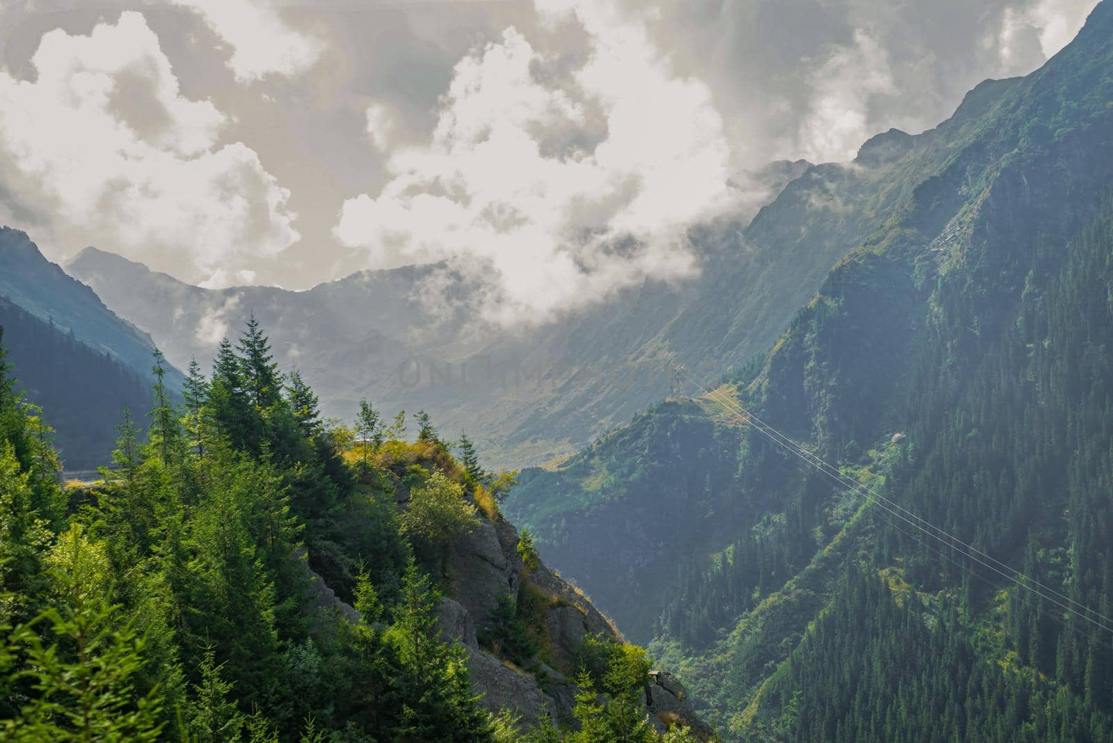 Beautiful landscape of high green mountains and turns of Transfagarasan road, is one of the most beautiful roads in the world. Carpathians. Romania. by aprilphoto