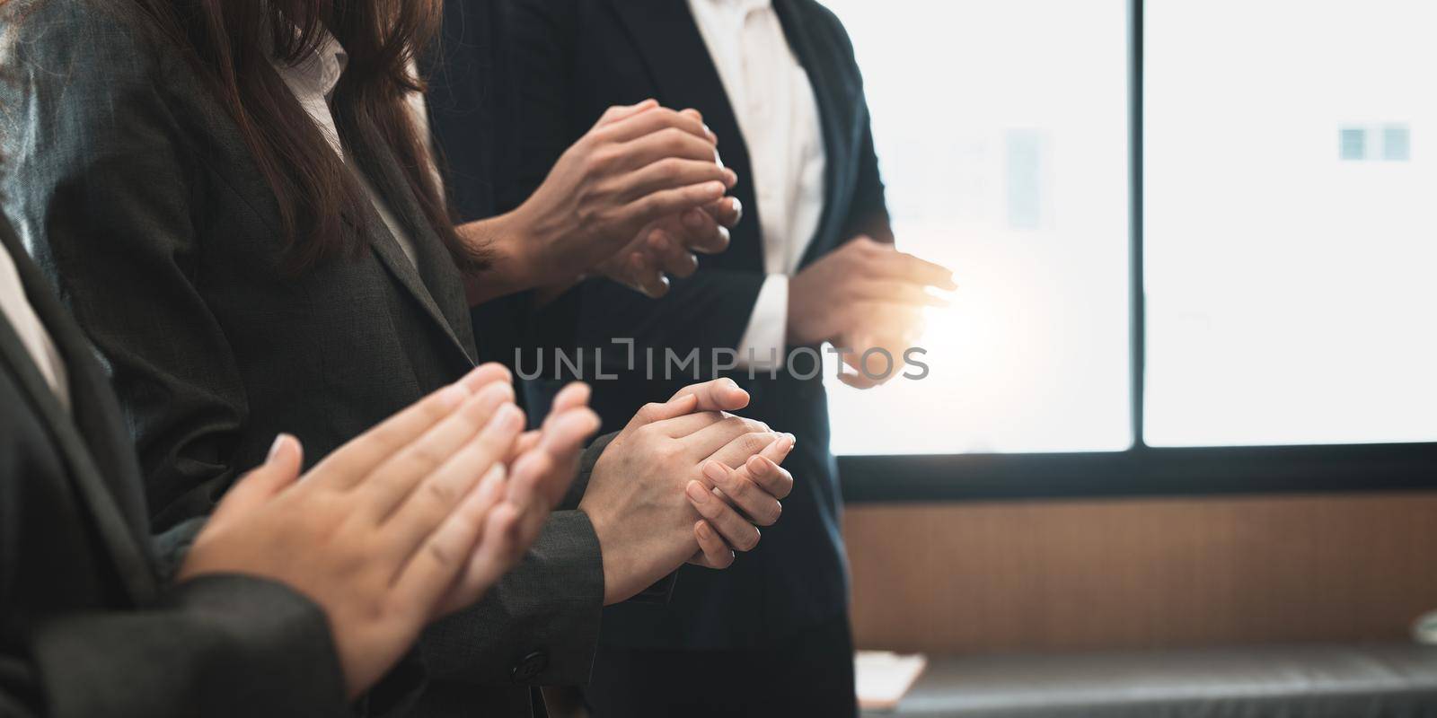 Photo of partners clapping hands after business seminar. Professional education, work meeting, presentation or coaching concept.