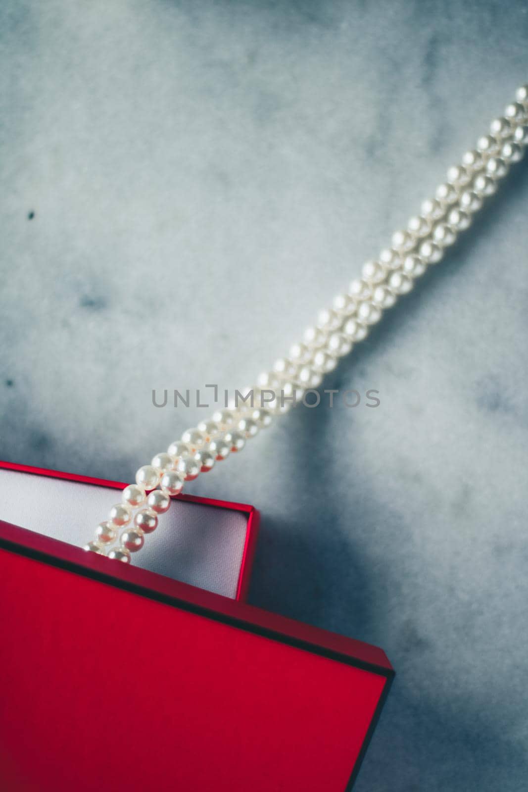 wonderful pearls in a red gift box, luxe present - jewellery and luxury gift for her styled concept, elegant visuals