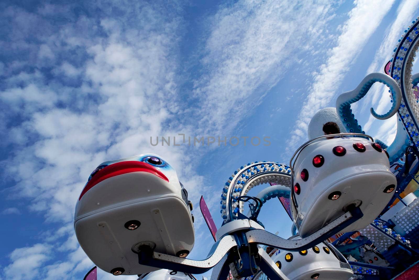 Ride and blue sky at a fairground