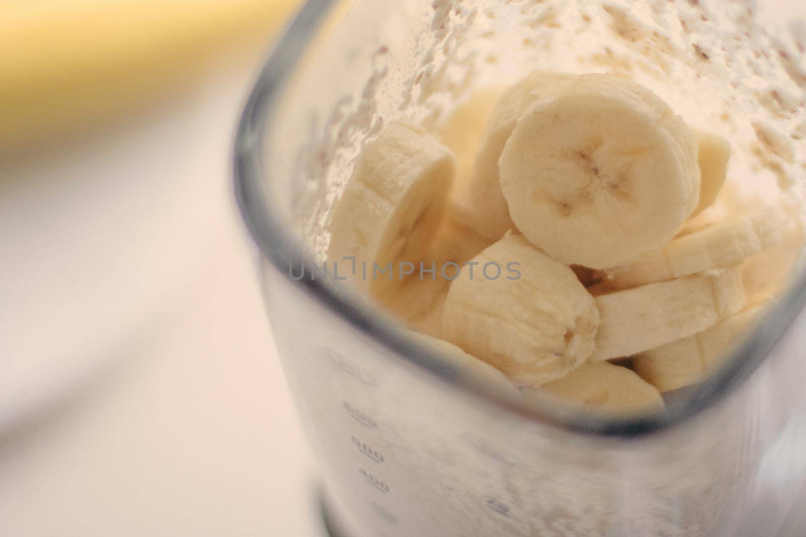 banana cocoa smoothie - healthy eating recipe styled concept by Anneleven