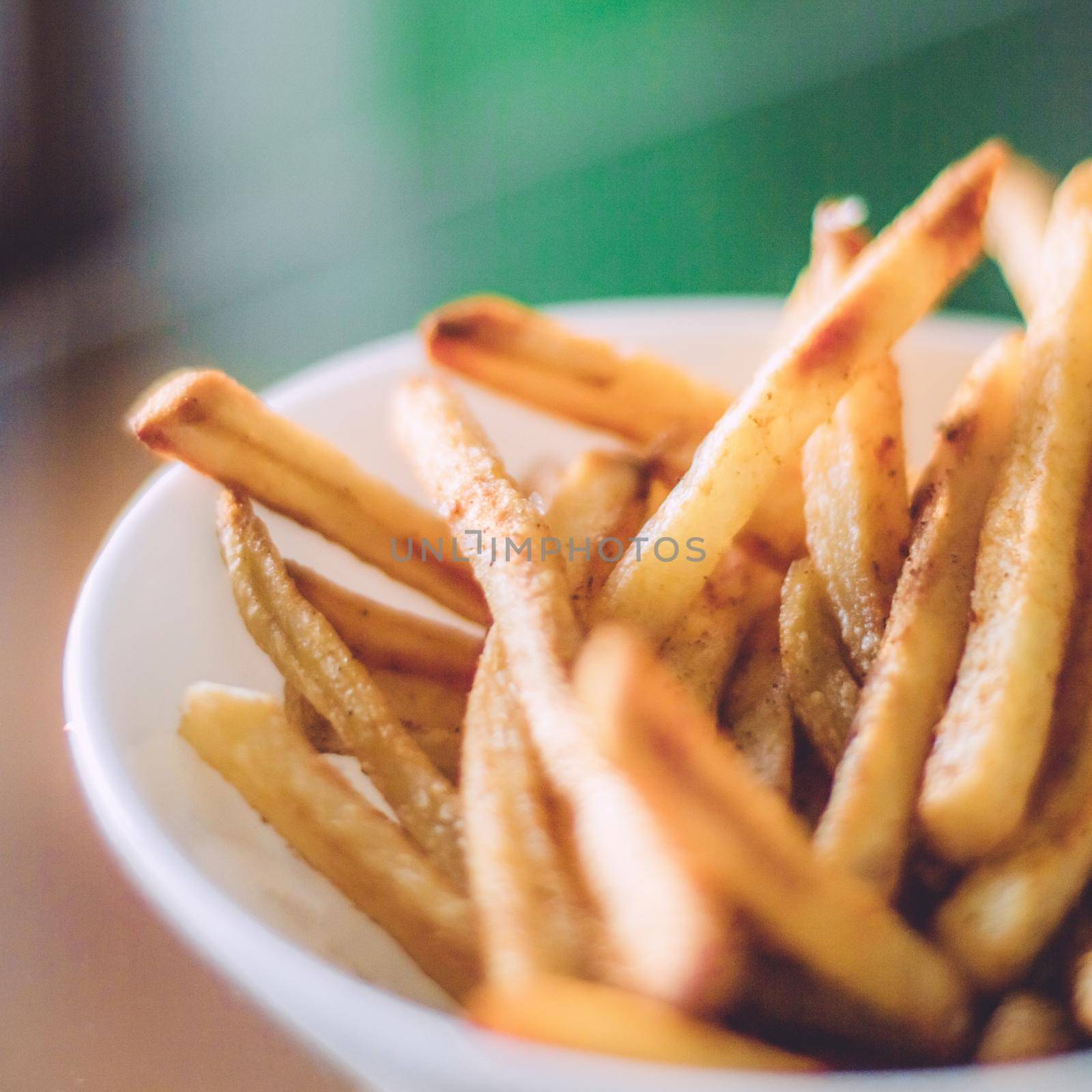 rustic food and homemade cooking styled concept - just cooked french fries served, elegant visuals