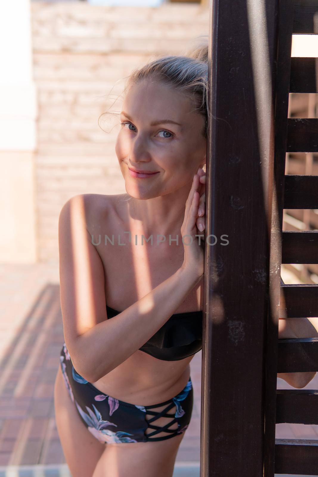 Smiling swimsuit glasses fence girl summer young street female dress, concept cute lifestyle for portrait and sunny travel, summertime pure. Cheerful glamour,