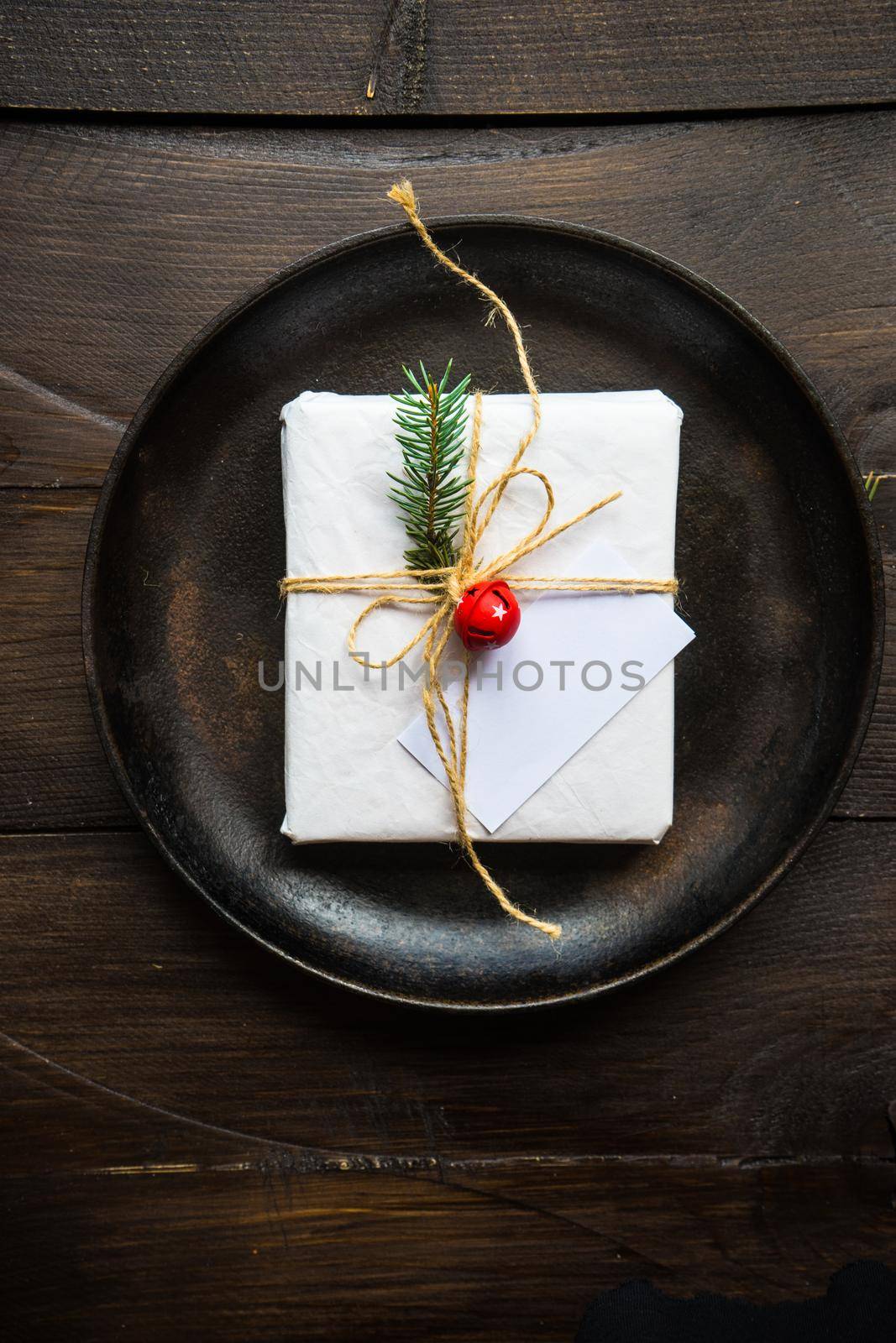 Festive table setting for Christmas holiday dinner with vintage flatware and decoration