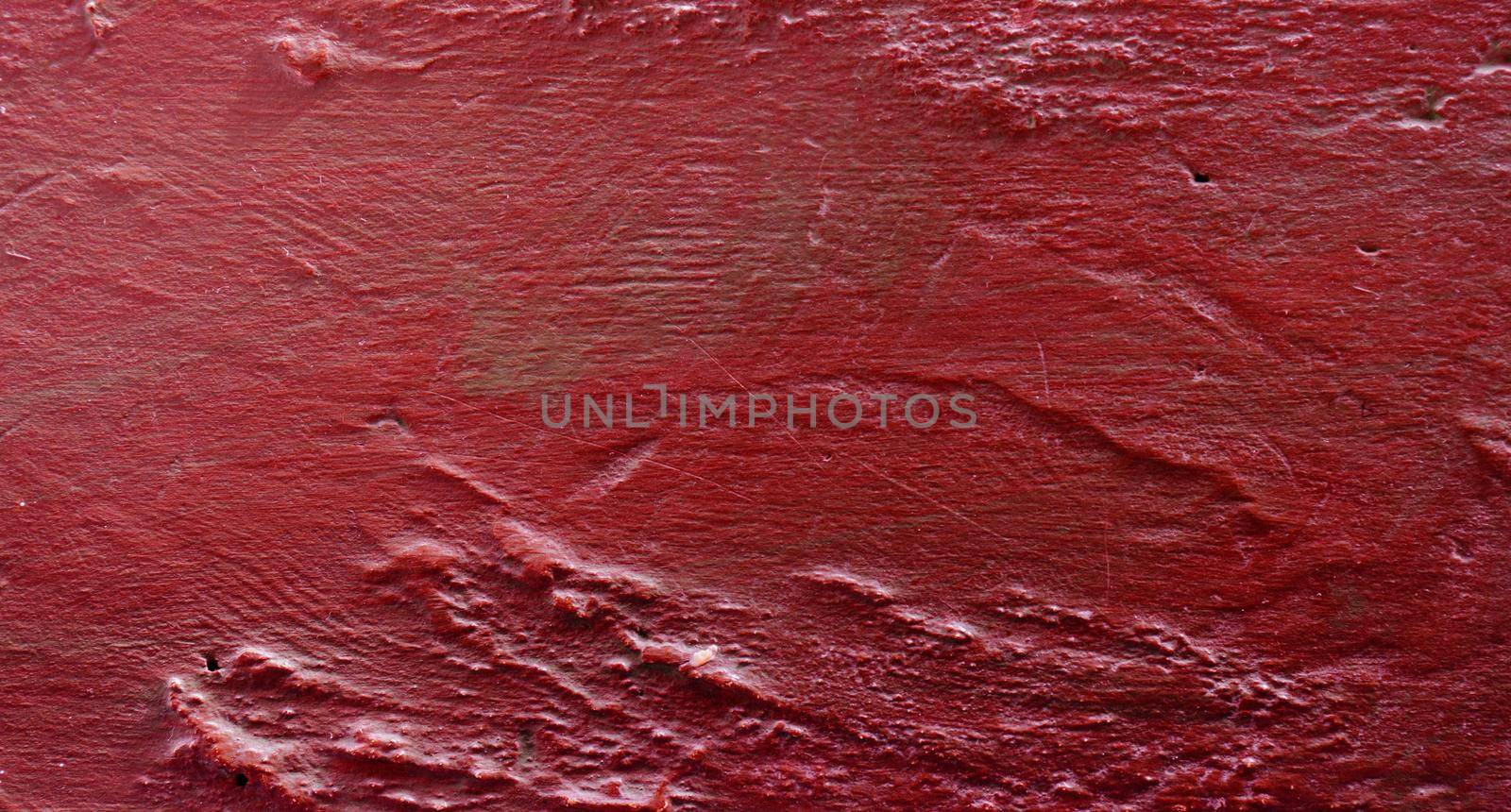 Background for design with copy space. Red textured concrete wall background