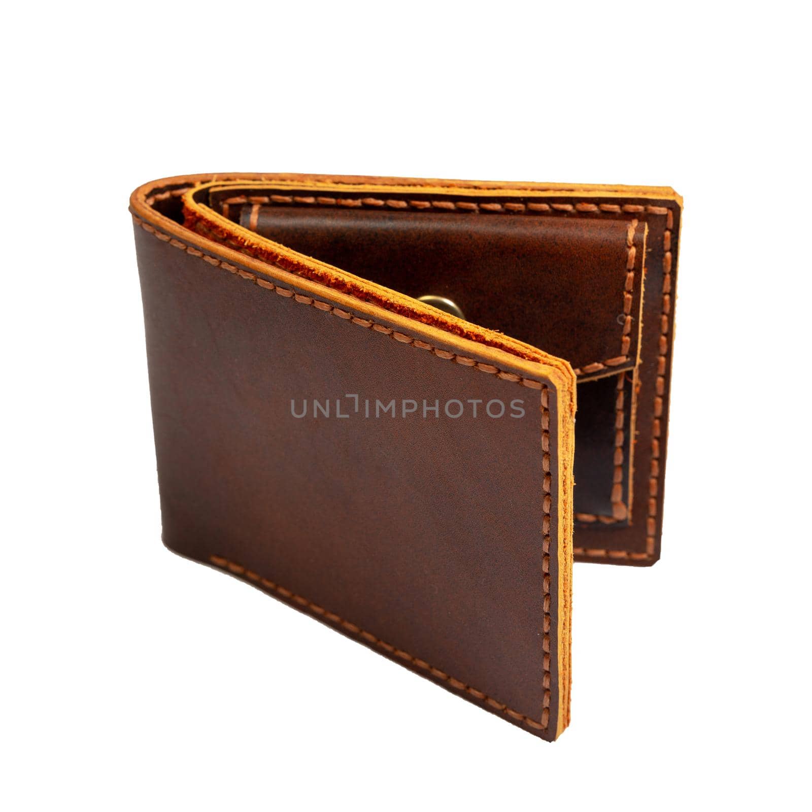 Open brown wallet for money and credit cards isolated on a white background close-up