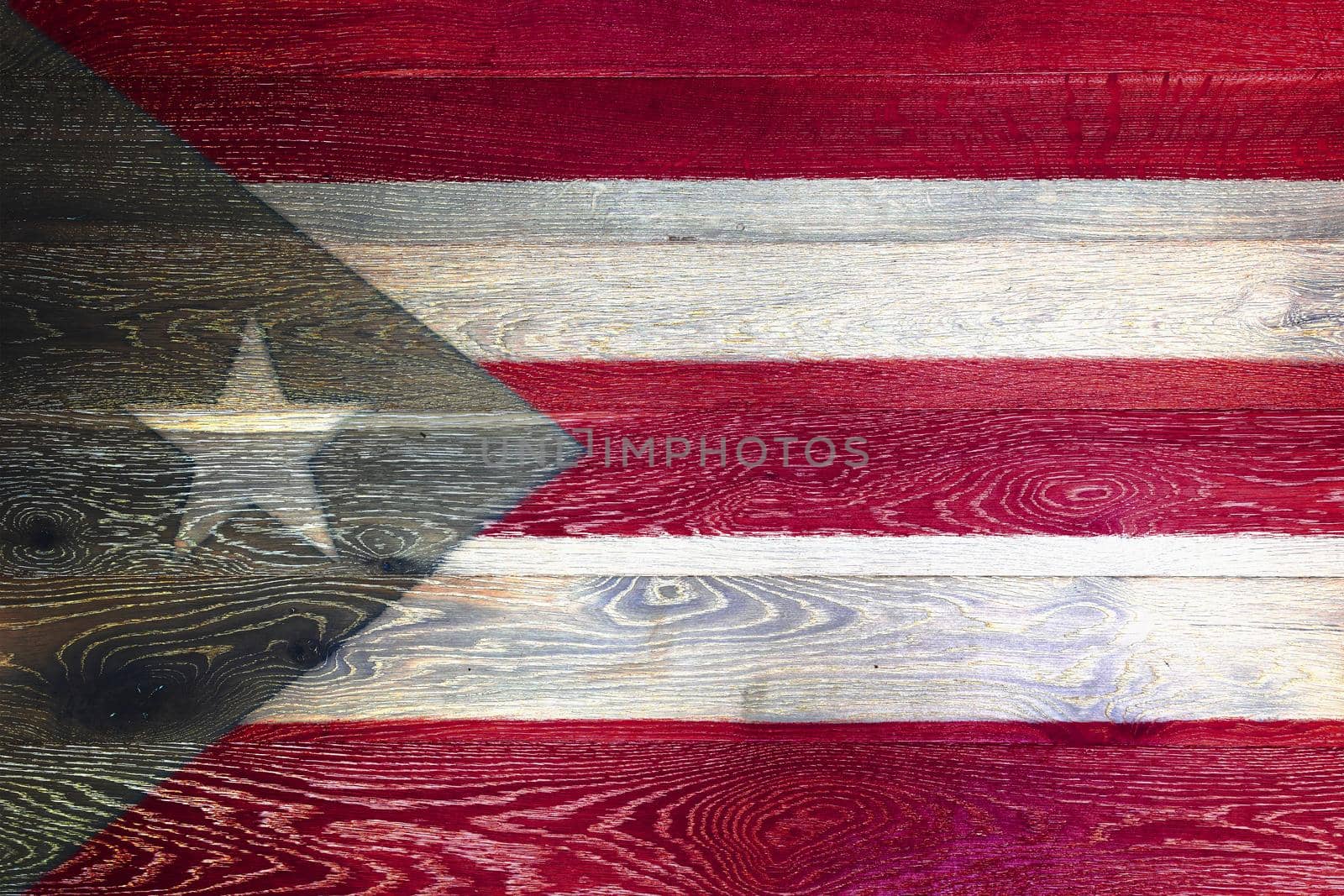 A Puerto rico flag on rustic old wood surface background red white stripe blue star