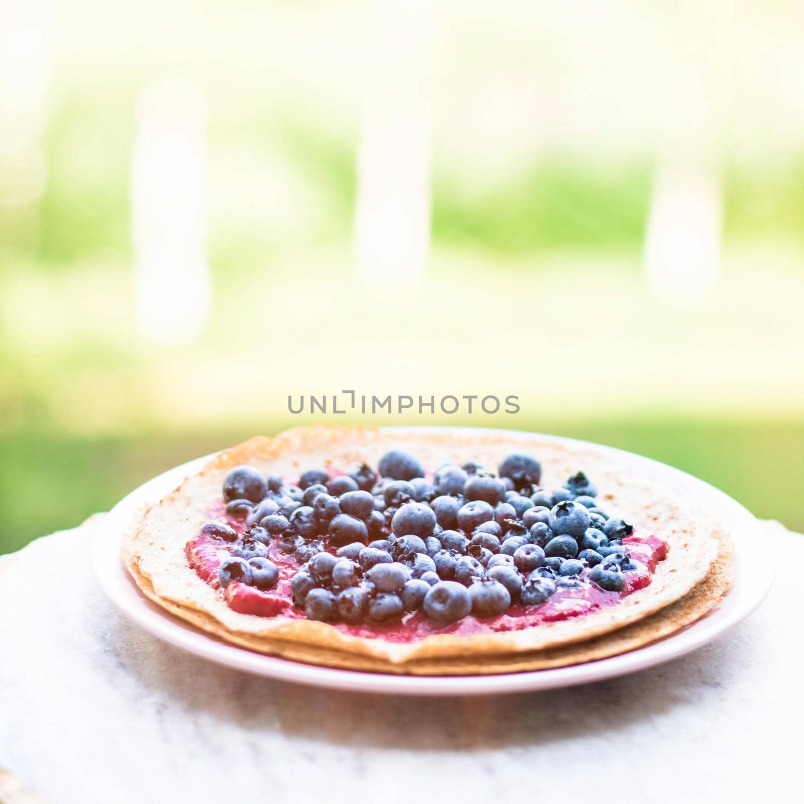 pastry dessert with blueberries - rustic cuisine recipes concept by Anneleven